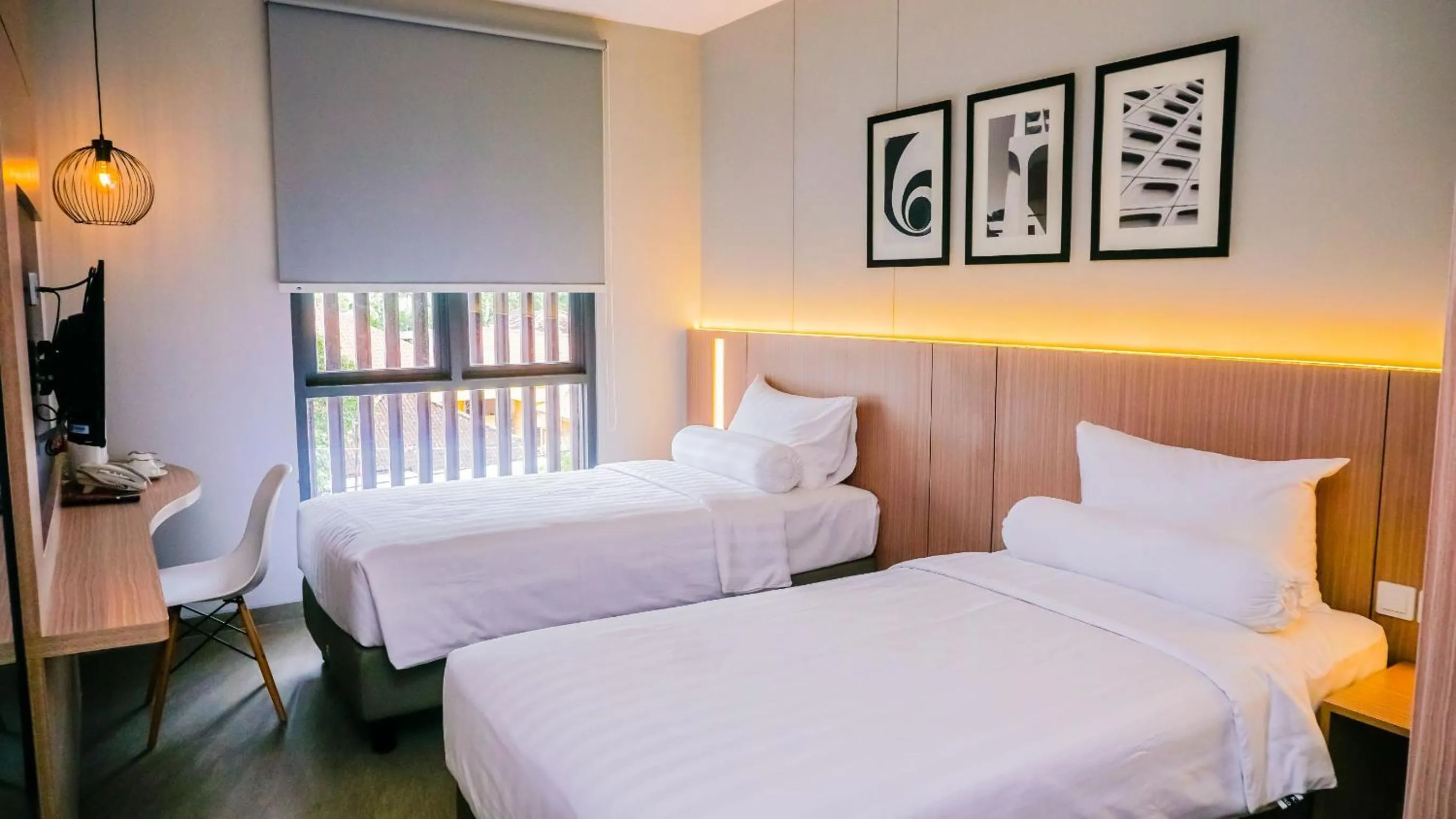 Property building, Bed in Front One King Hotel Tuban