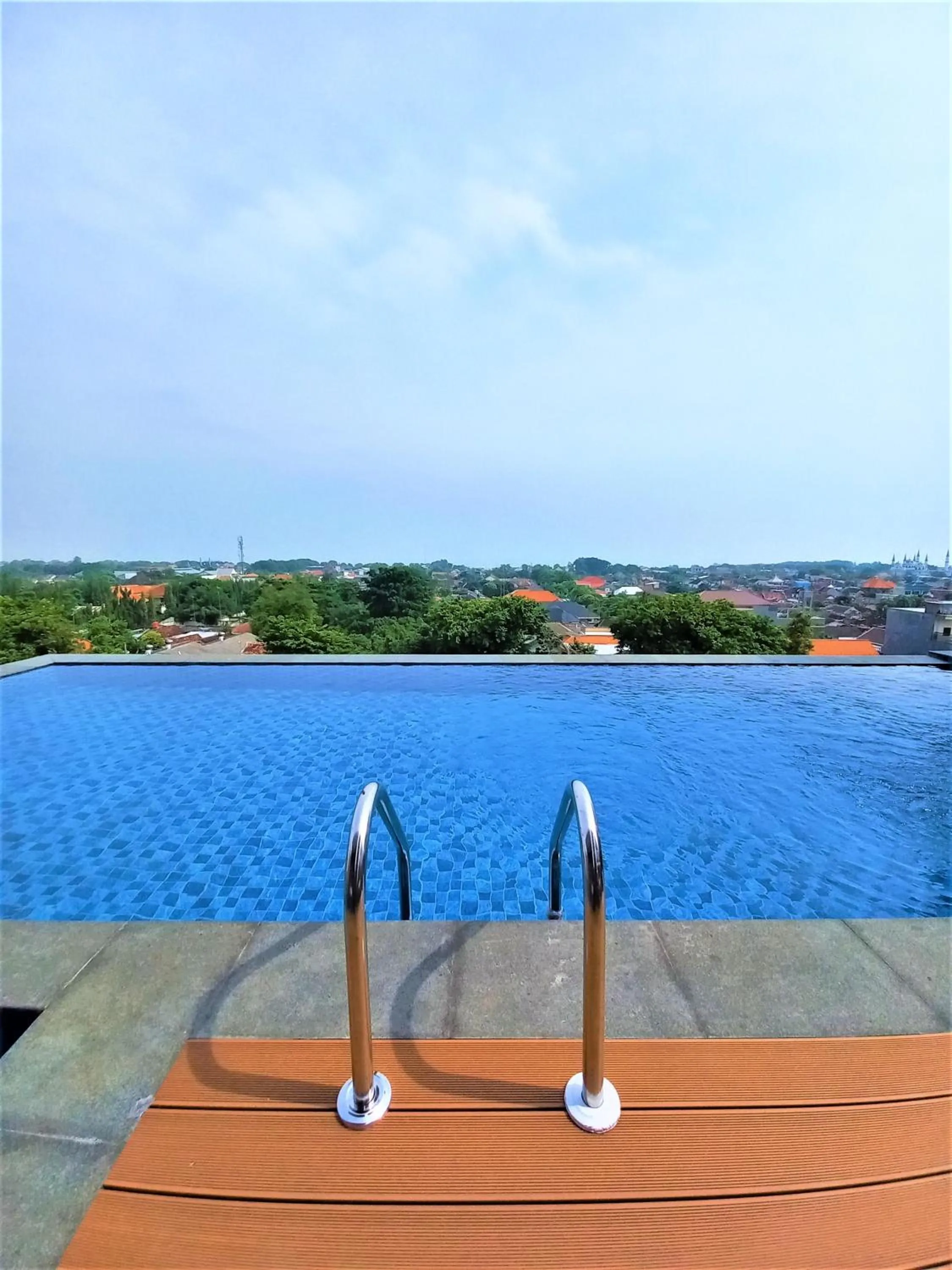 Swimming pool in Front One King Hotel Tuban