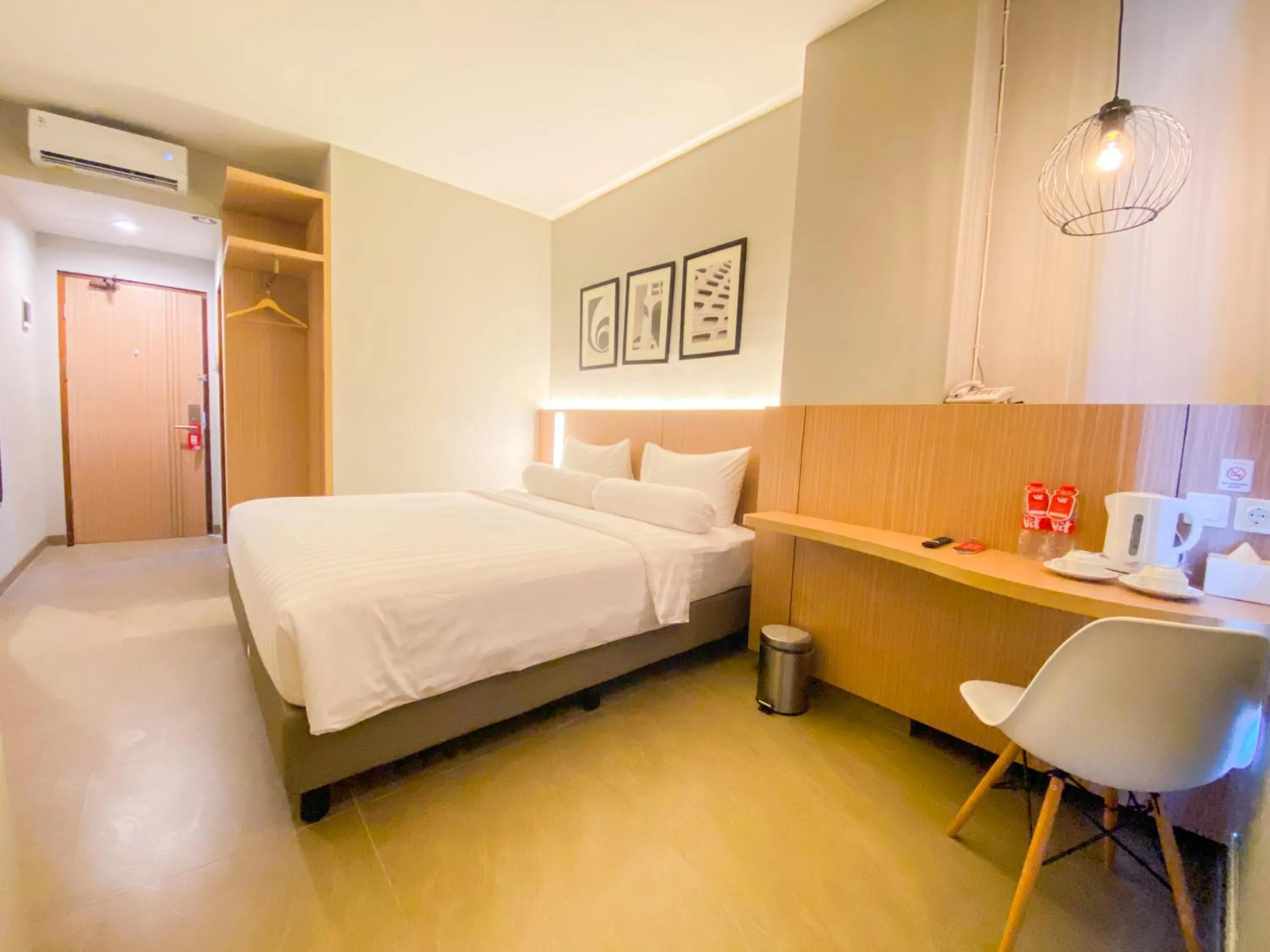 Bed in Front One King Hotel Tuban