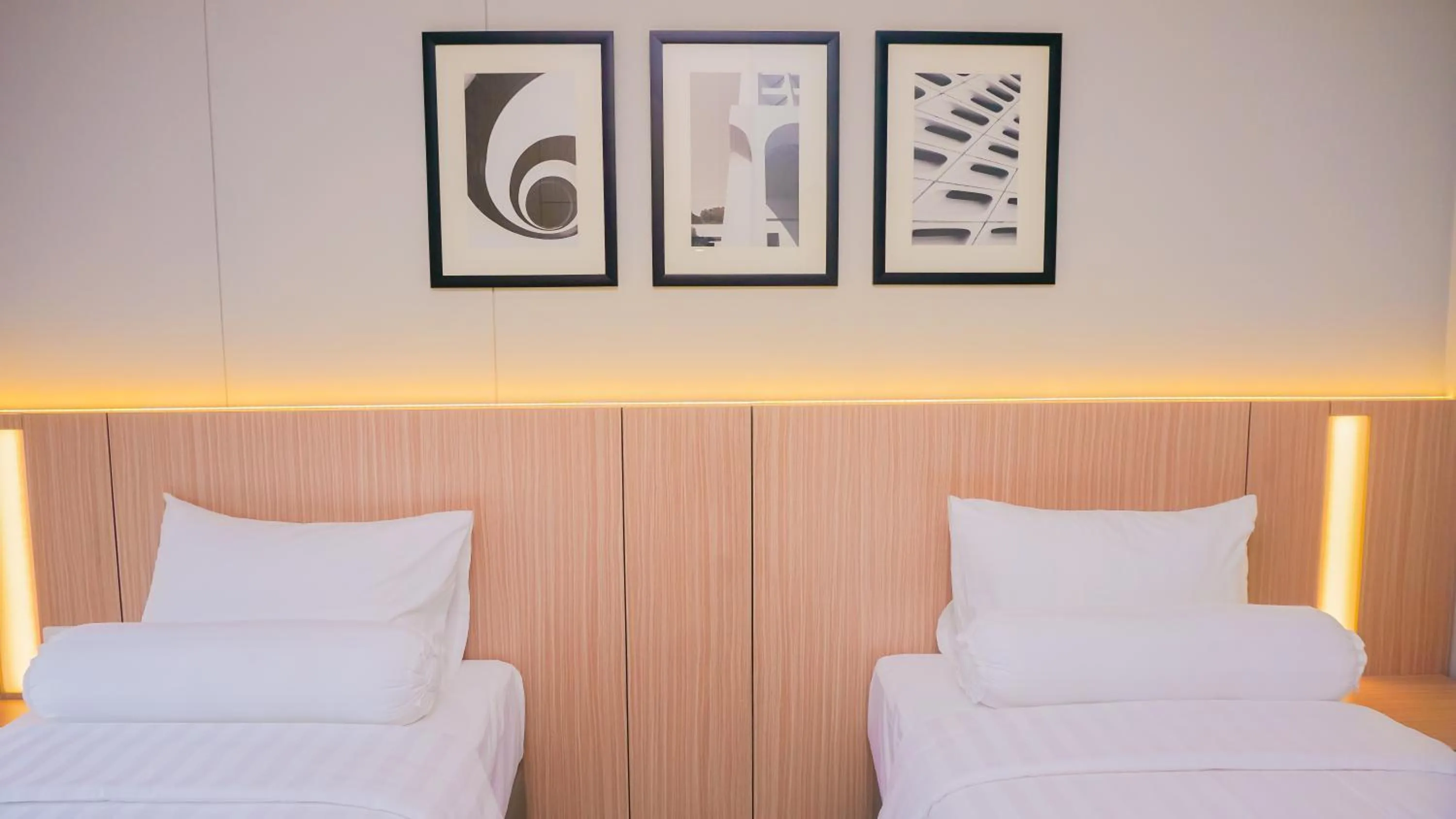 Property building, Bed in Front One King Hotel Tuban