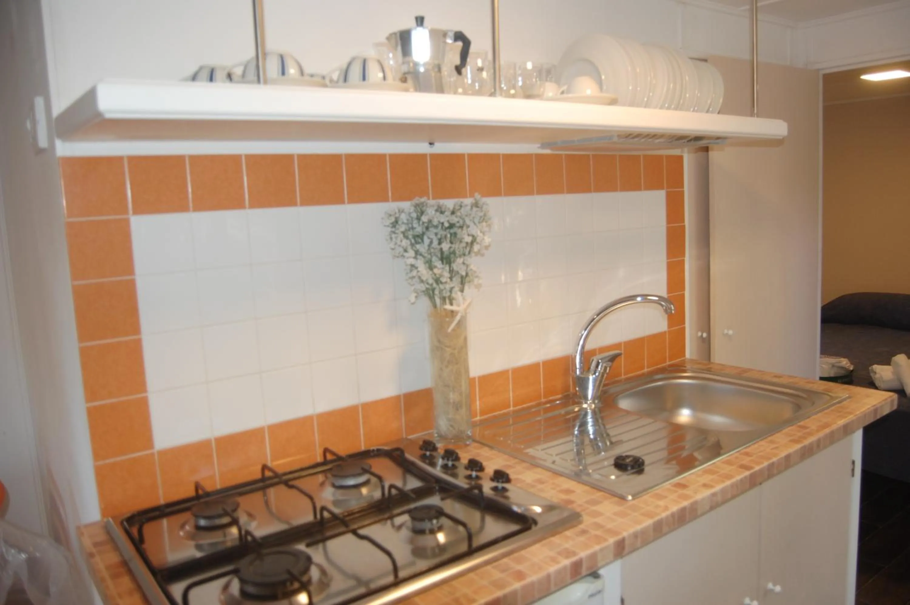 Kitchen or kitchenette in Villaggio Residence Nettuno