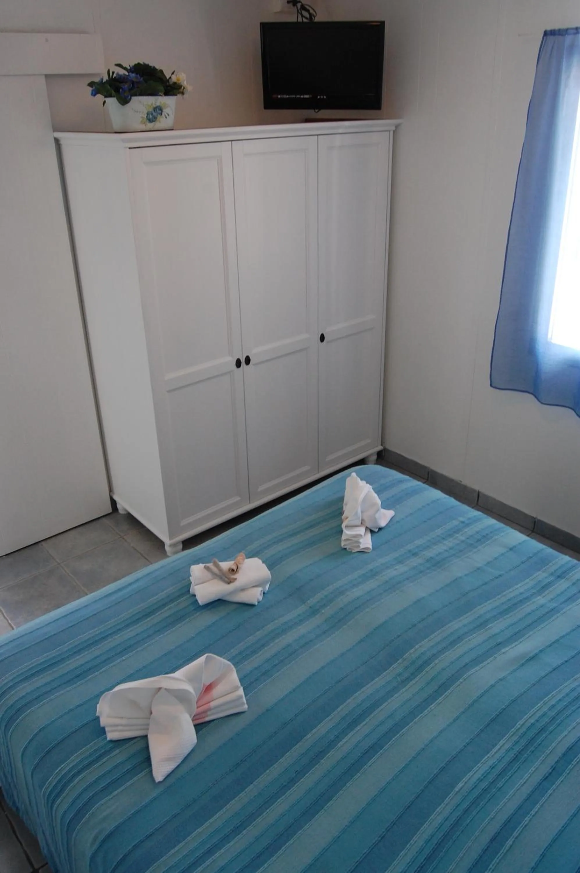 Bedroom, Bed in Villaggio Residence Nettuno