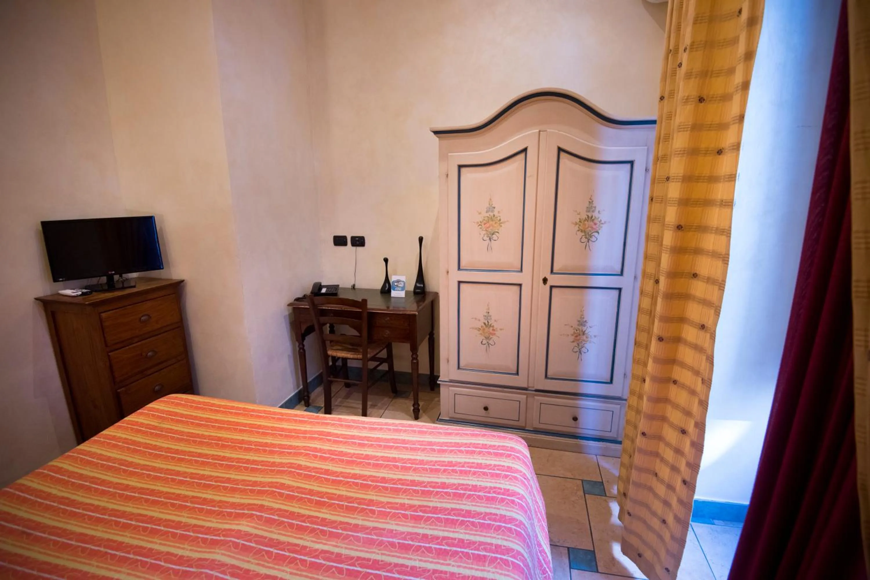 Bed in Schilizzi Hotel