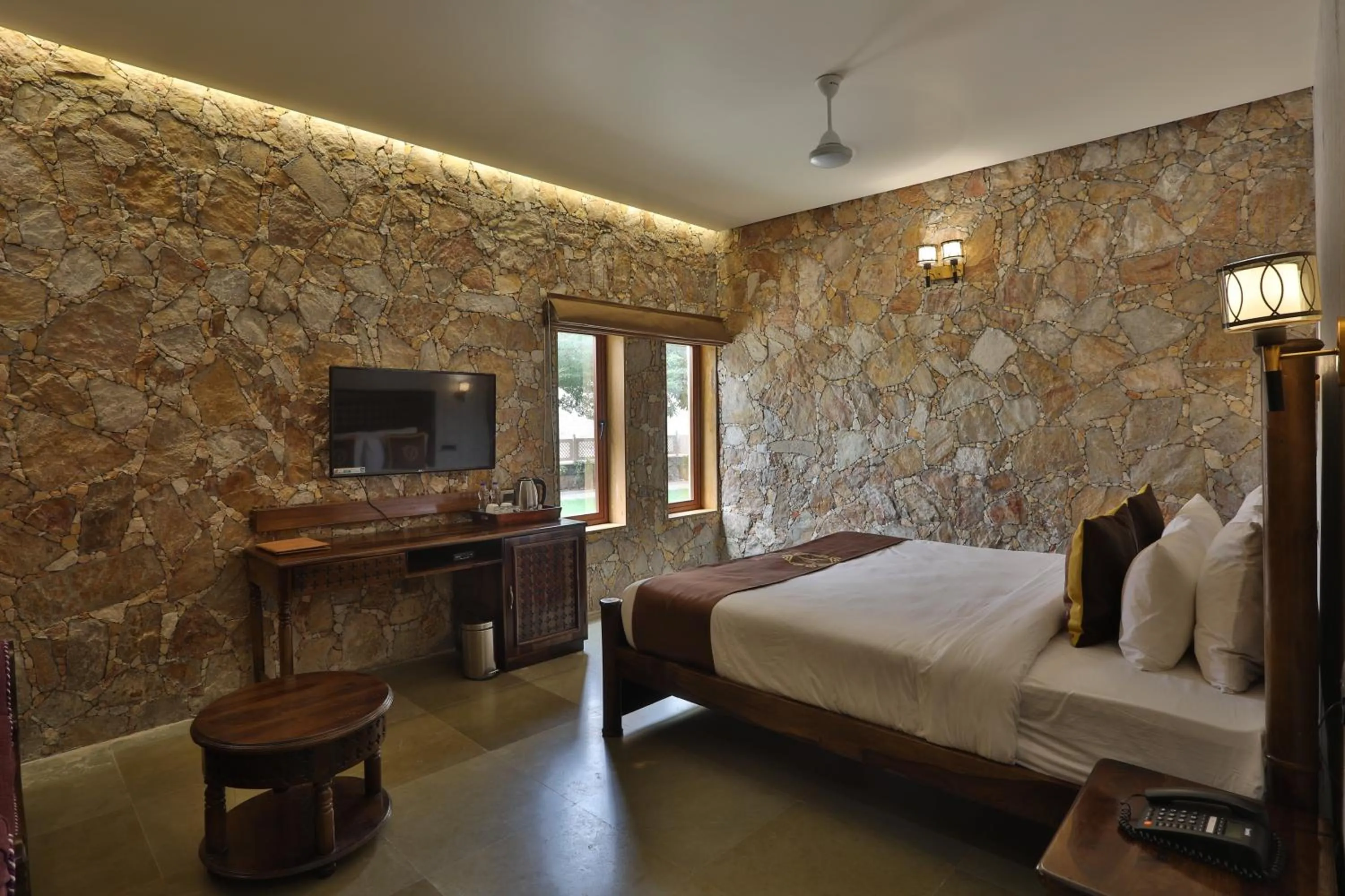 Bedroom, Bed in Vikrama Heritage Resort Pavagadh