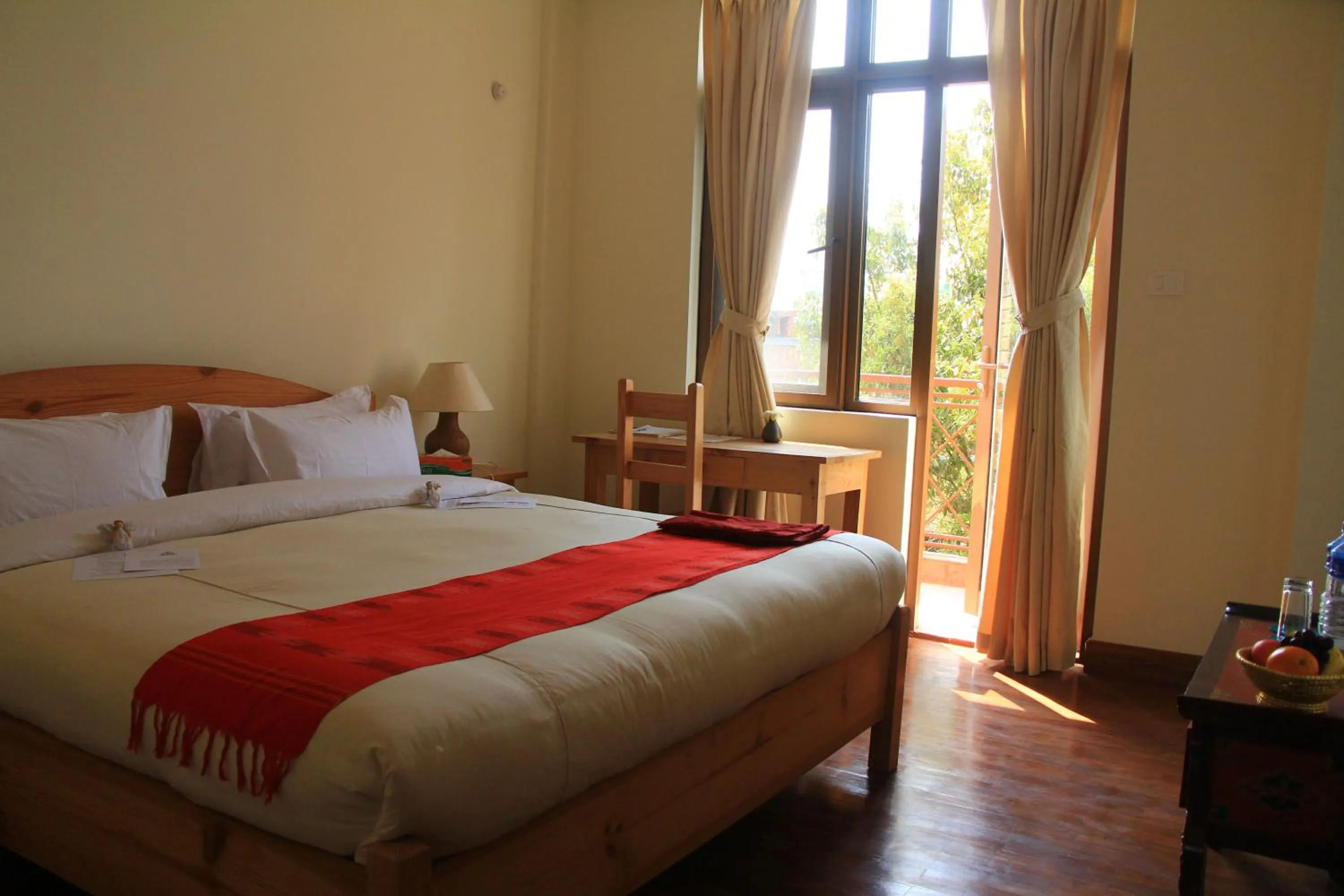 Bed in ROKPA Guest House