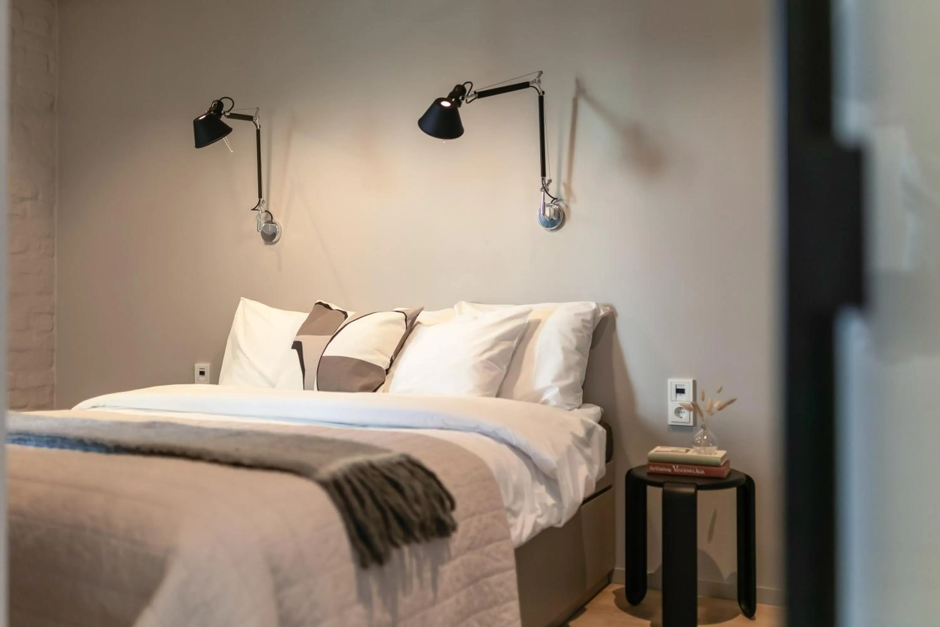 Bed in Unity Tampere - A Studio Hotel