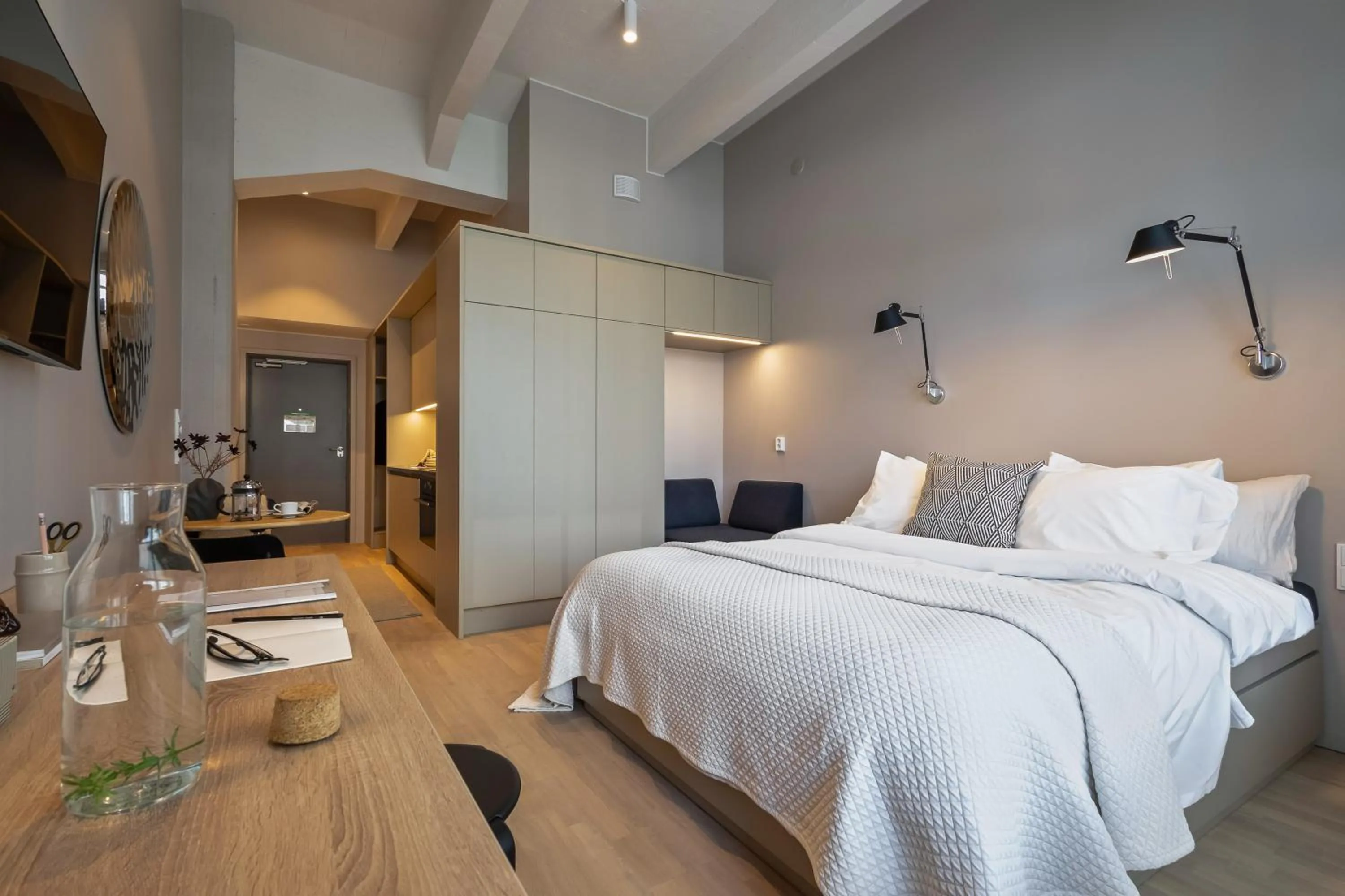 Bed in Unity Tampere - A Studio Hotel