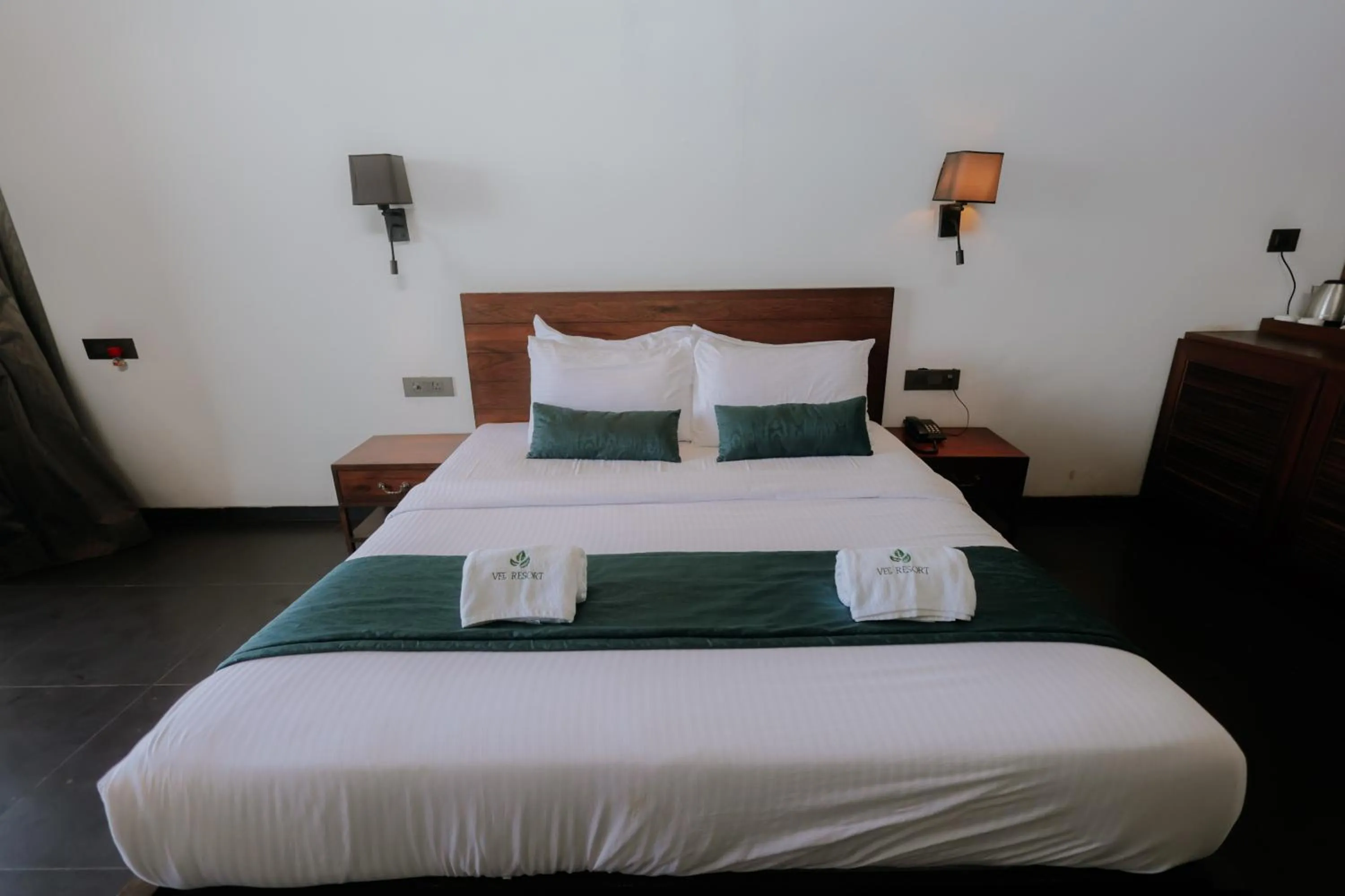 Bed in Vee Resort- The Suites of Royals