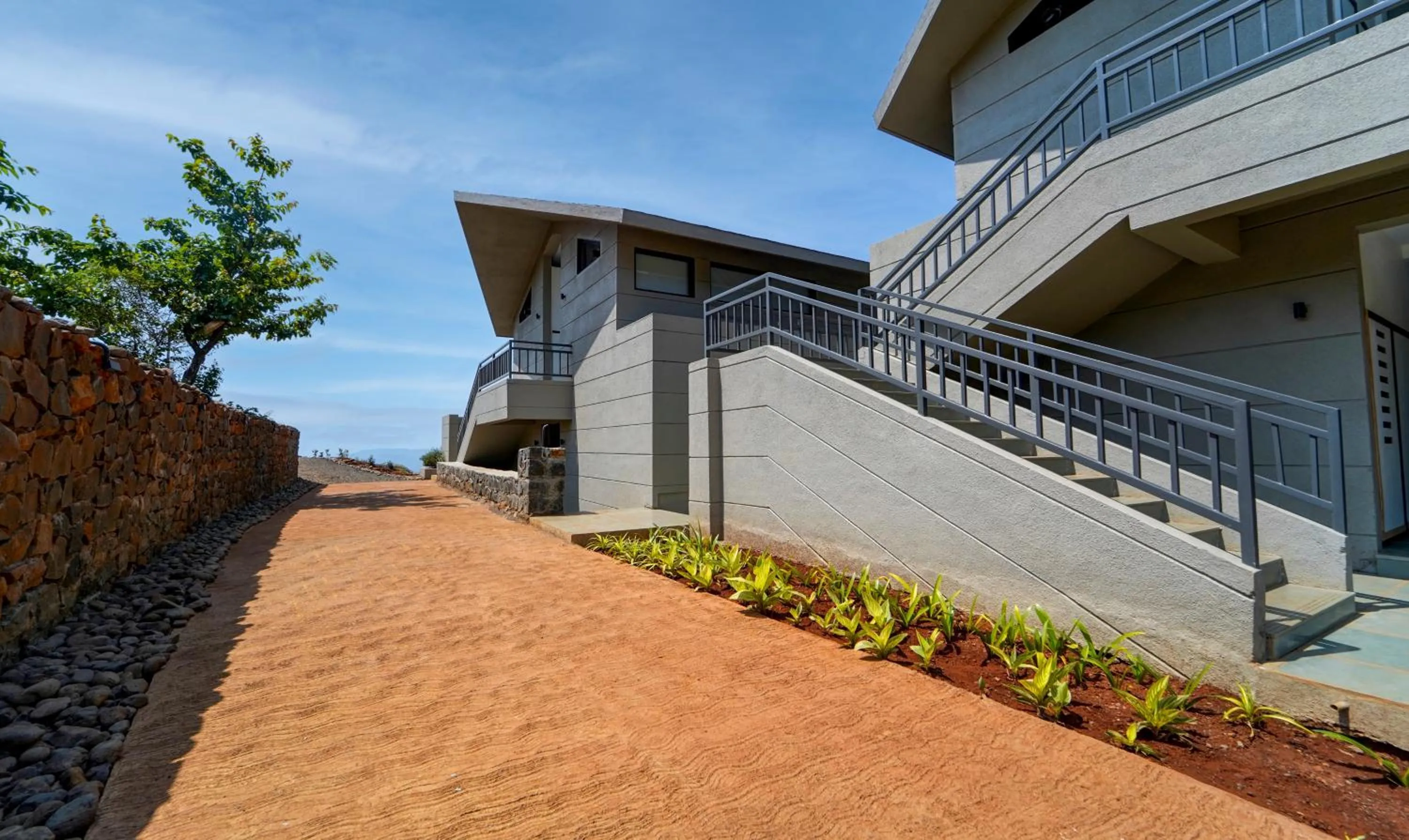 Property building in Vee Resort- The Suites of Royals