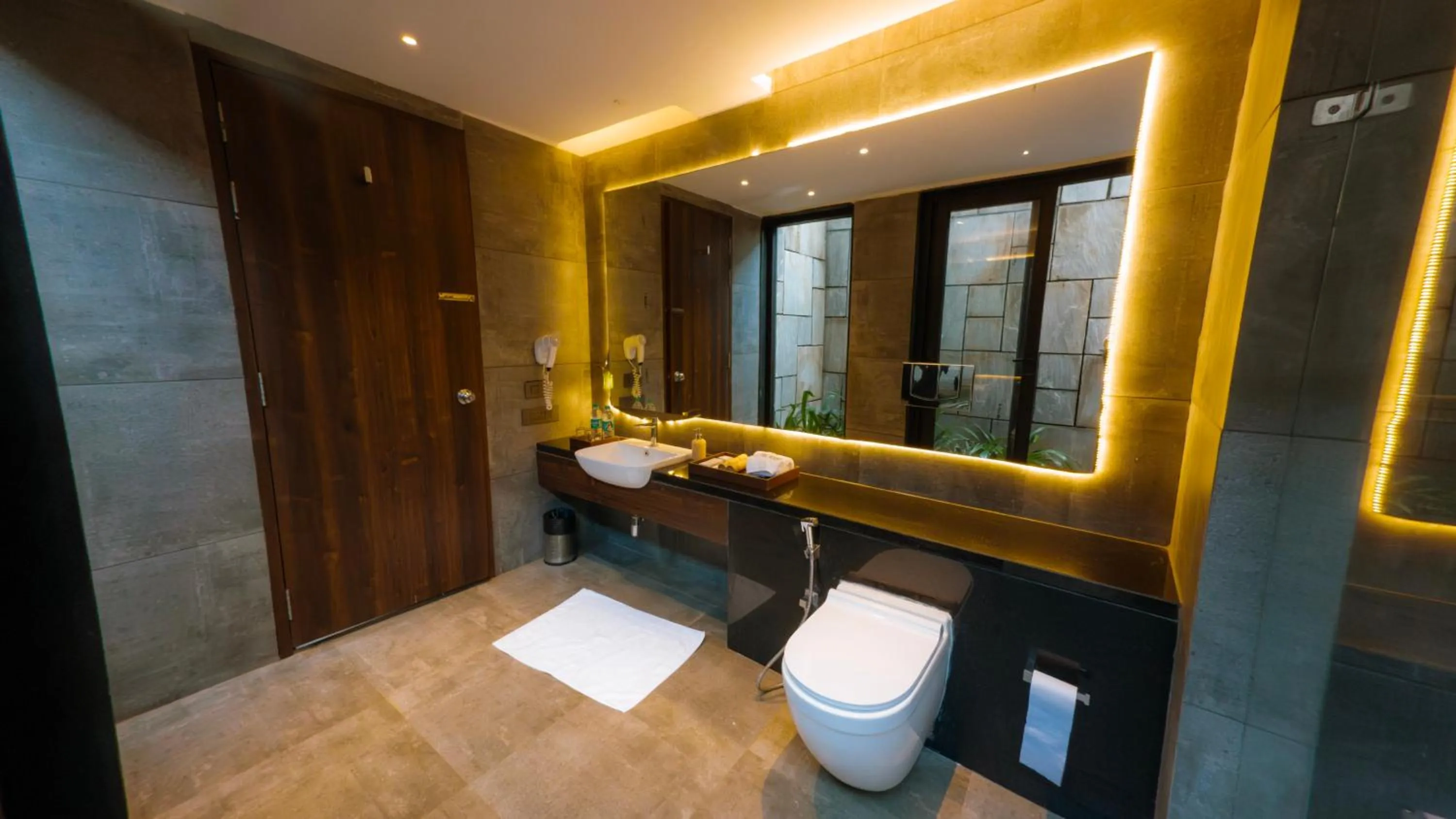 Bathroom in Vee Resort- The Suites of Royals