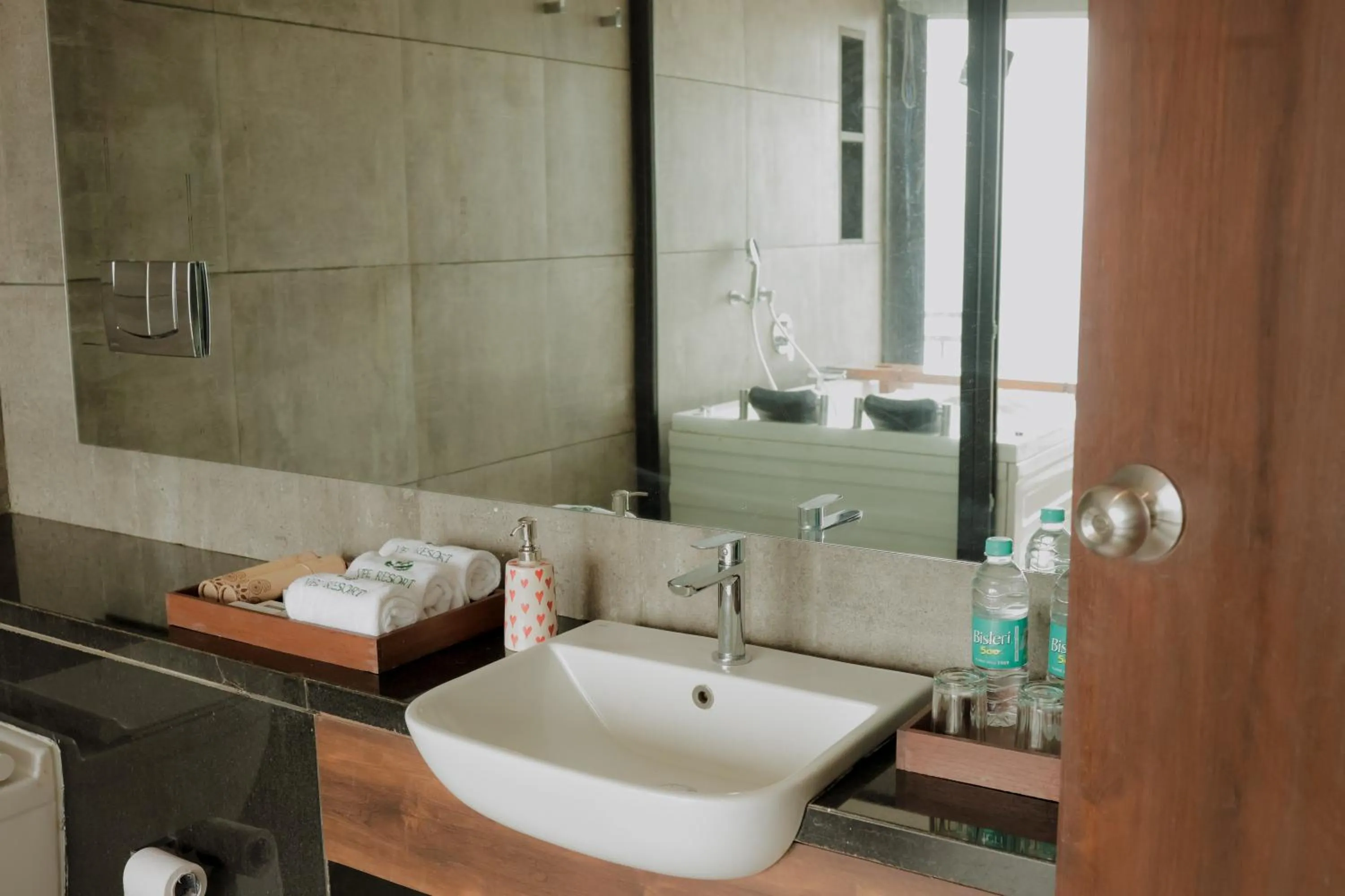Bathroom in Vee Resort- The Suites of Royals