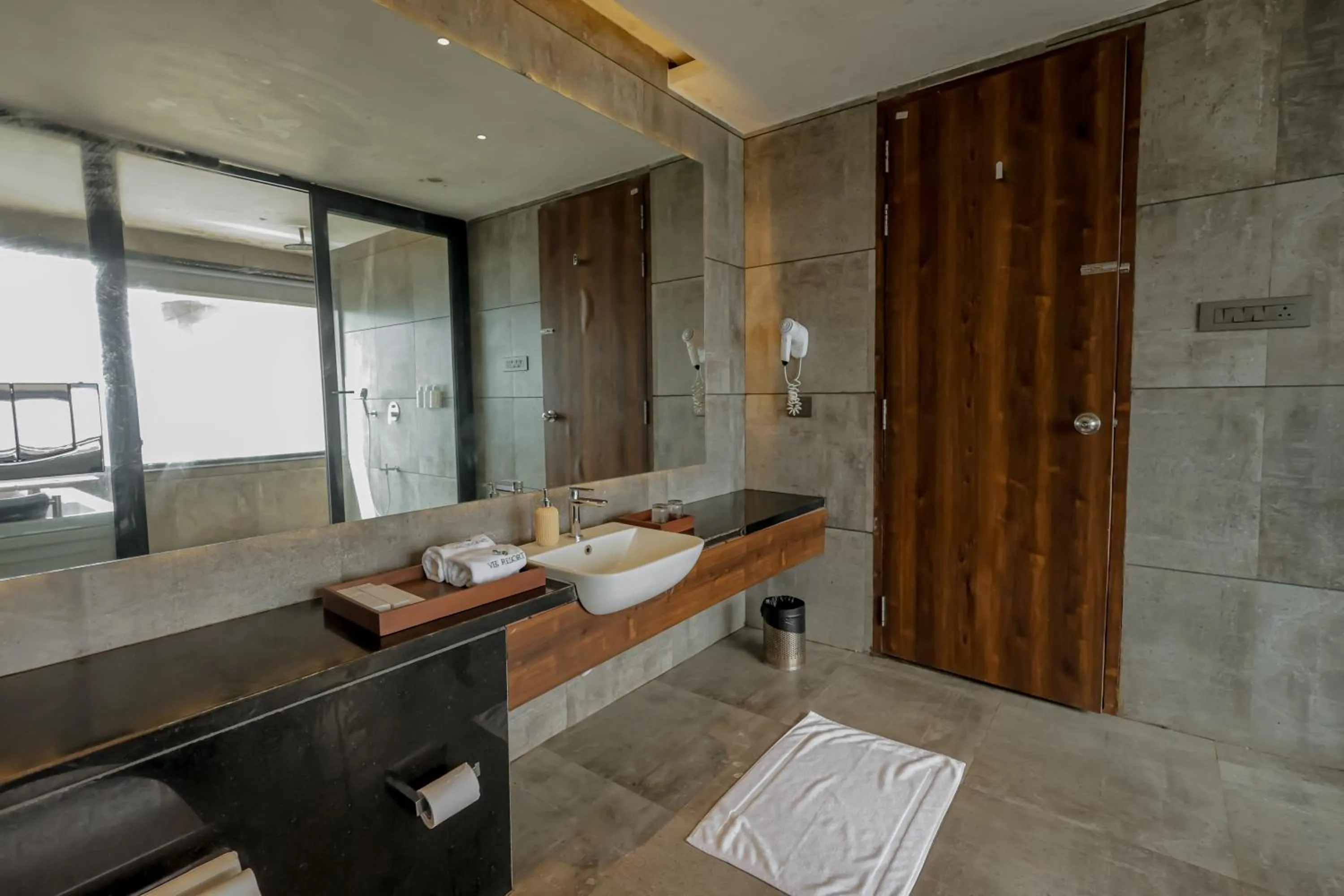 Bathroom in Vee Resort- The Suites of Royals