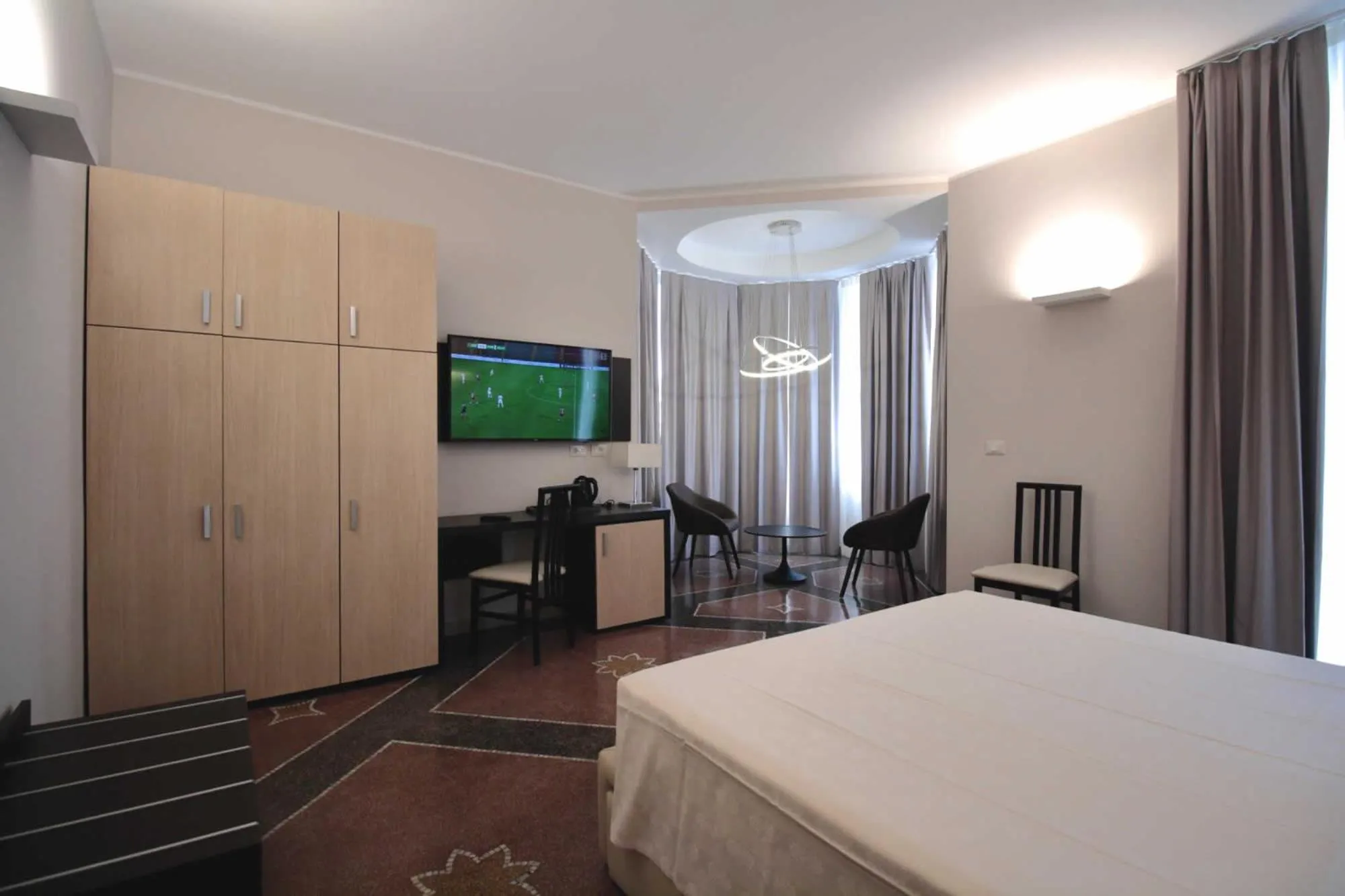 Bed in Hotel Vittoria