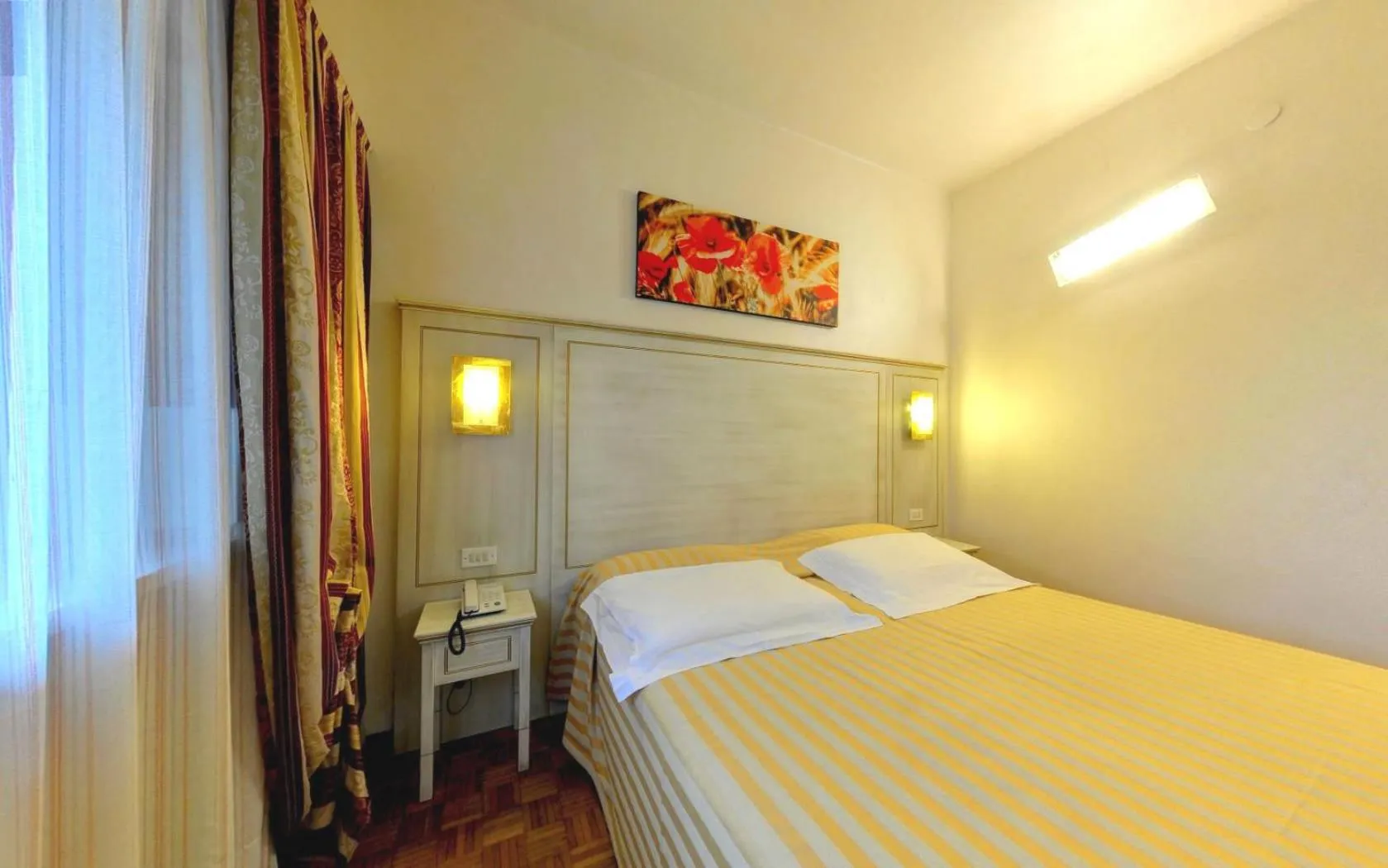 Bed in Ai Ronchi Motor Hotel Brescia