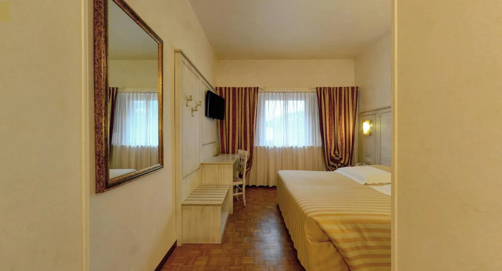 Bed in Ai Ronchi Motor Hotel Brescia