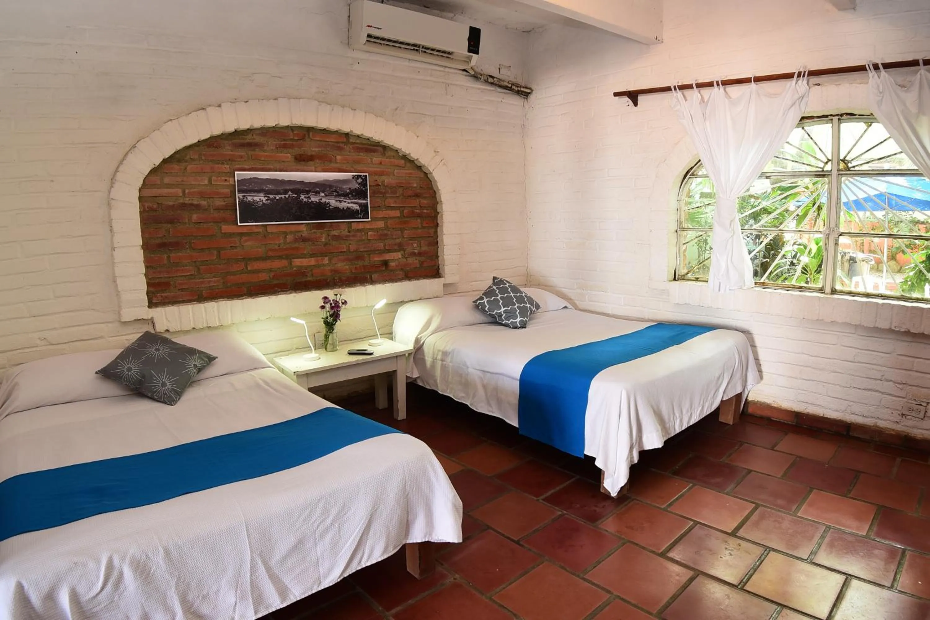 Bed in Sayulita Beach House Hotel
