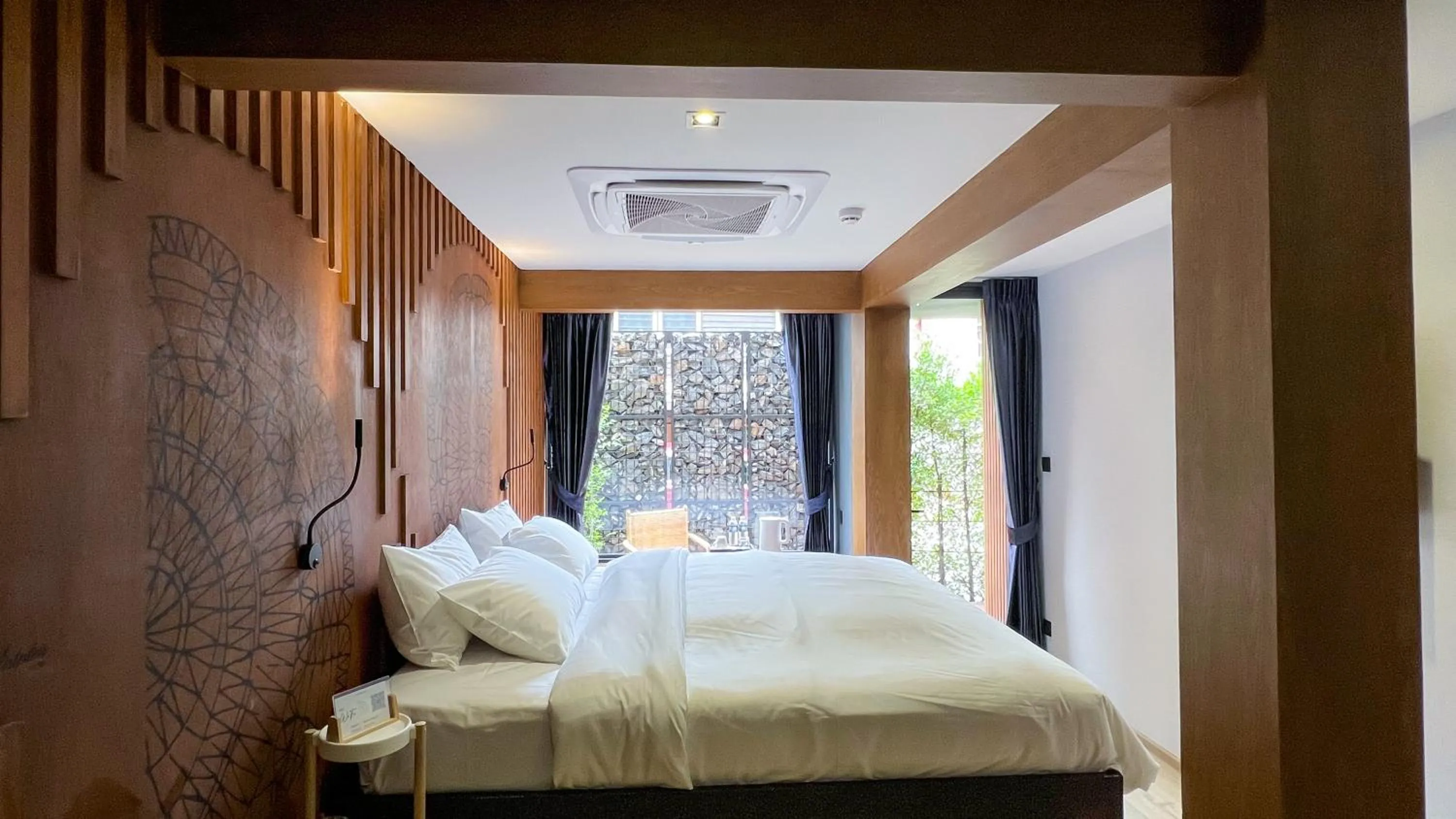 Photo of the whole room, Bed in The Nhorm Hotel Ratchada