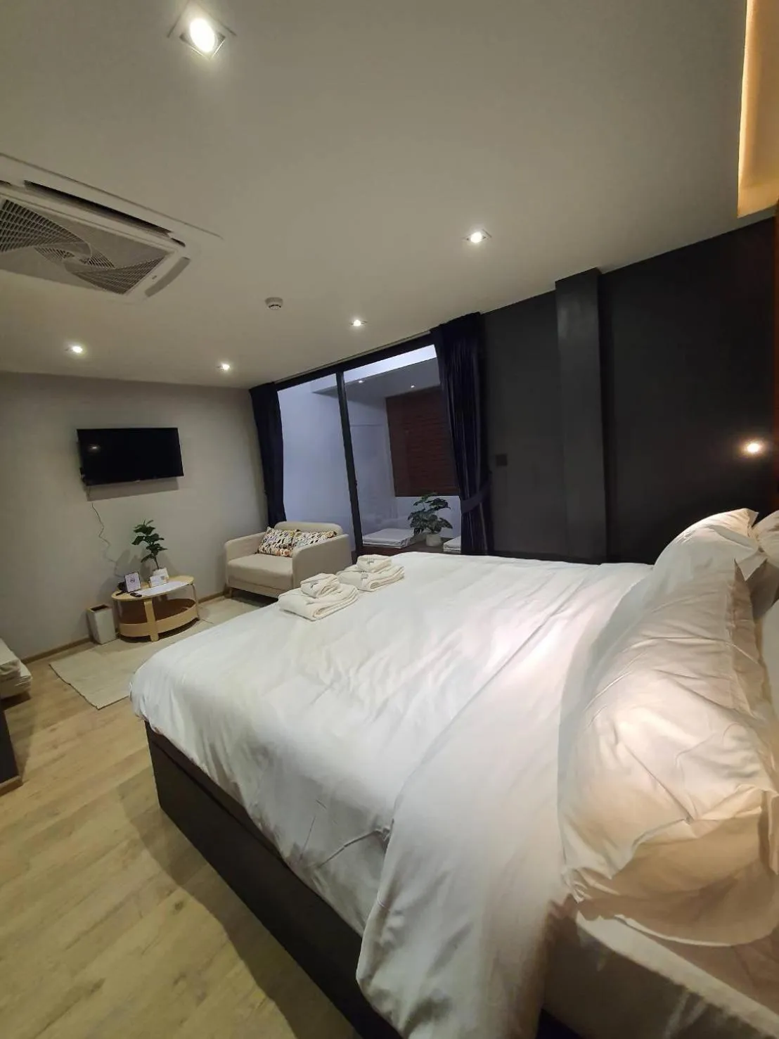 Photo of the whole room, Bed in The Nhorm Hotel Ratchada