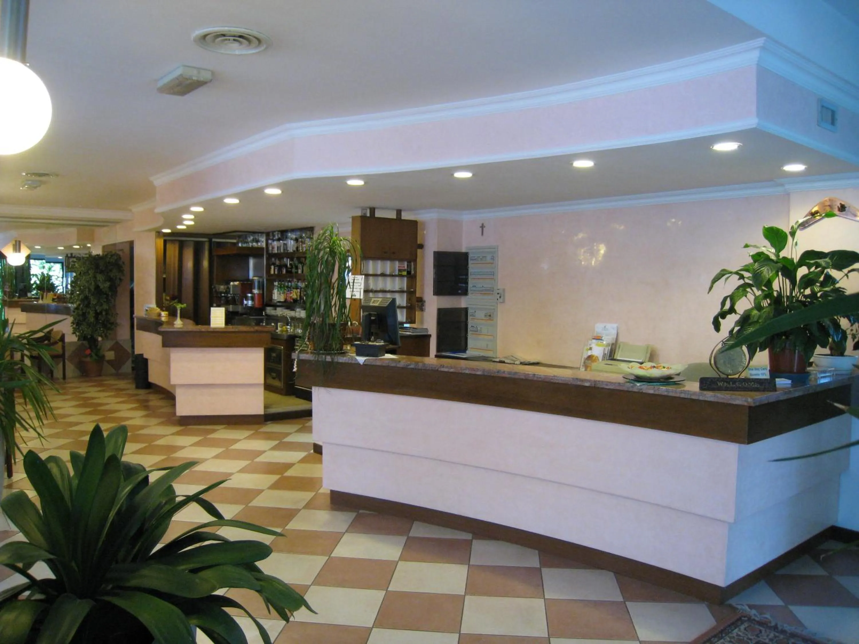 Lobby or reception in Hotel Boomerang - Check-in & Meals in front at hotel Sporting