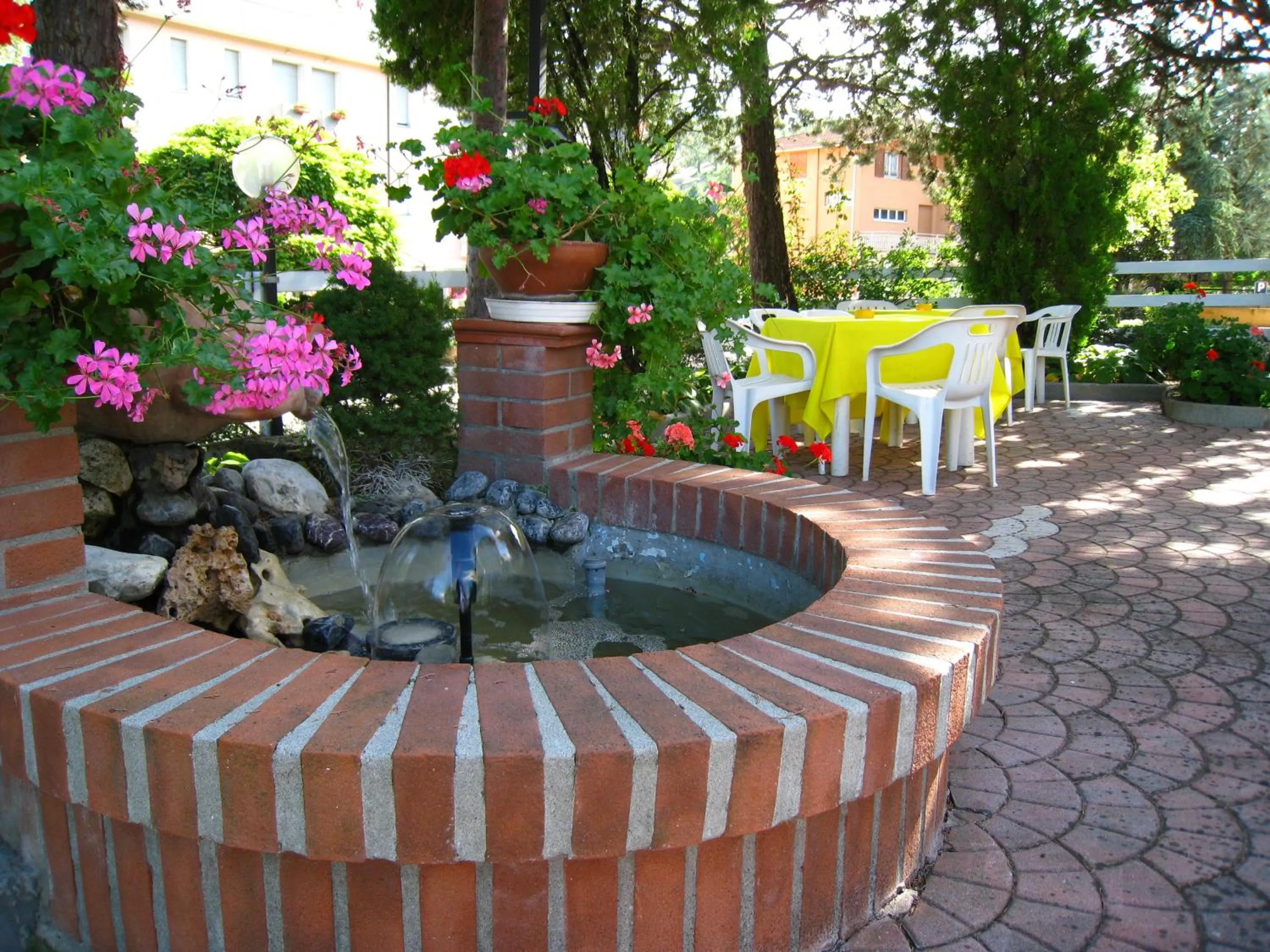 Garden in Hotel Boomerang - Check-in & Meals in front at hotel Sporting