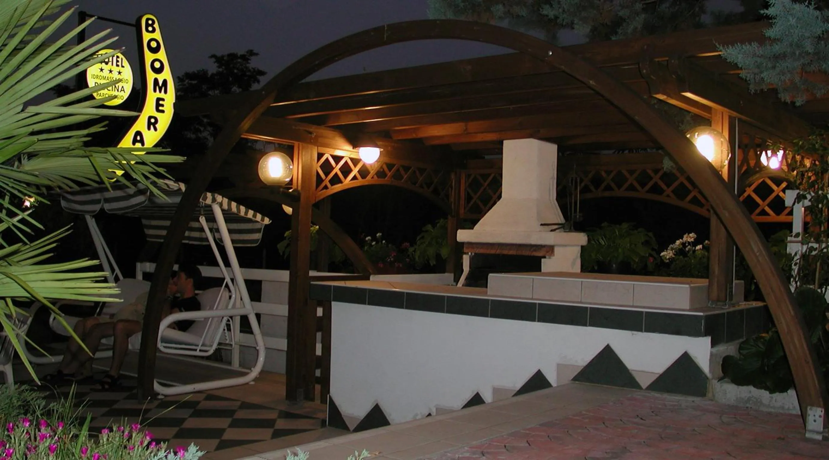 Garden in Hotel Boomerang - Check-in & Meals in front at hotel Sporting