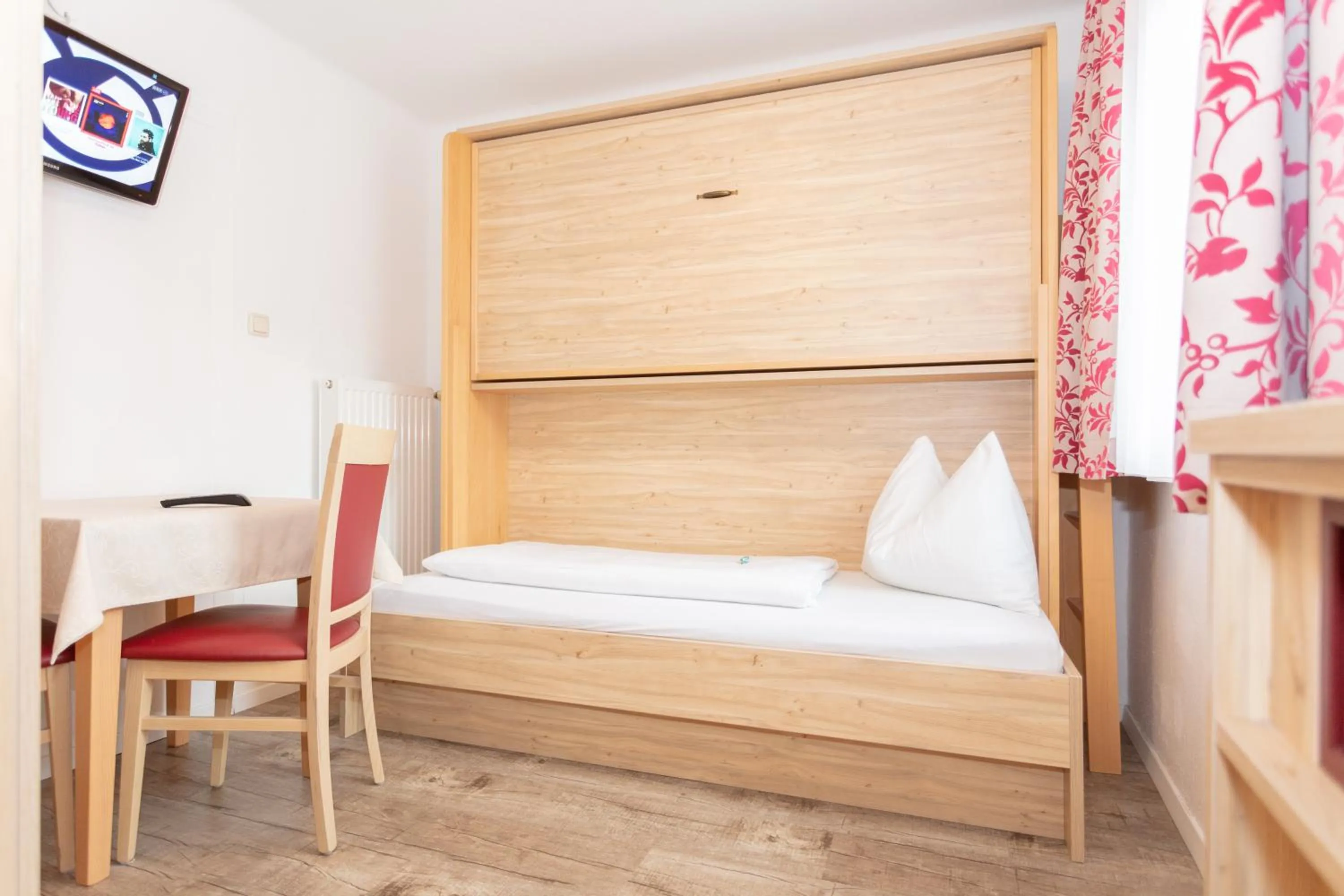 Bed in Schmittental Pension Self-Check-In