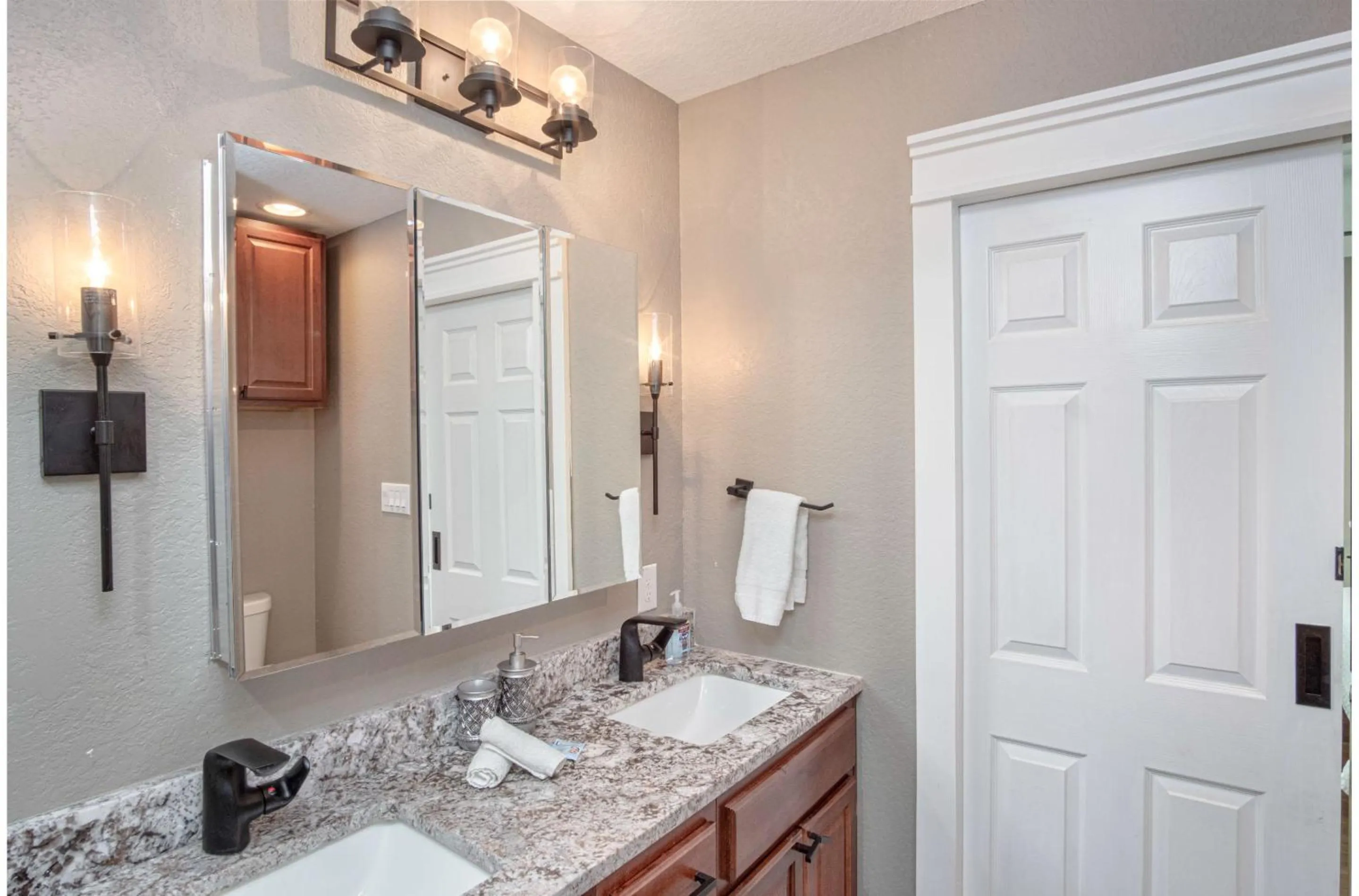 Bathroom in Lovely 3 BR Home Only 9 Minutes from Downtown