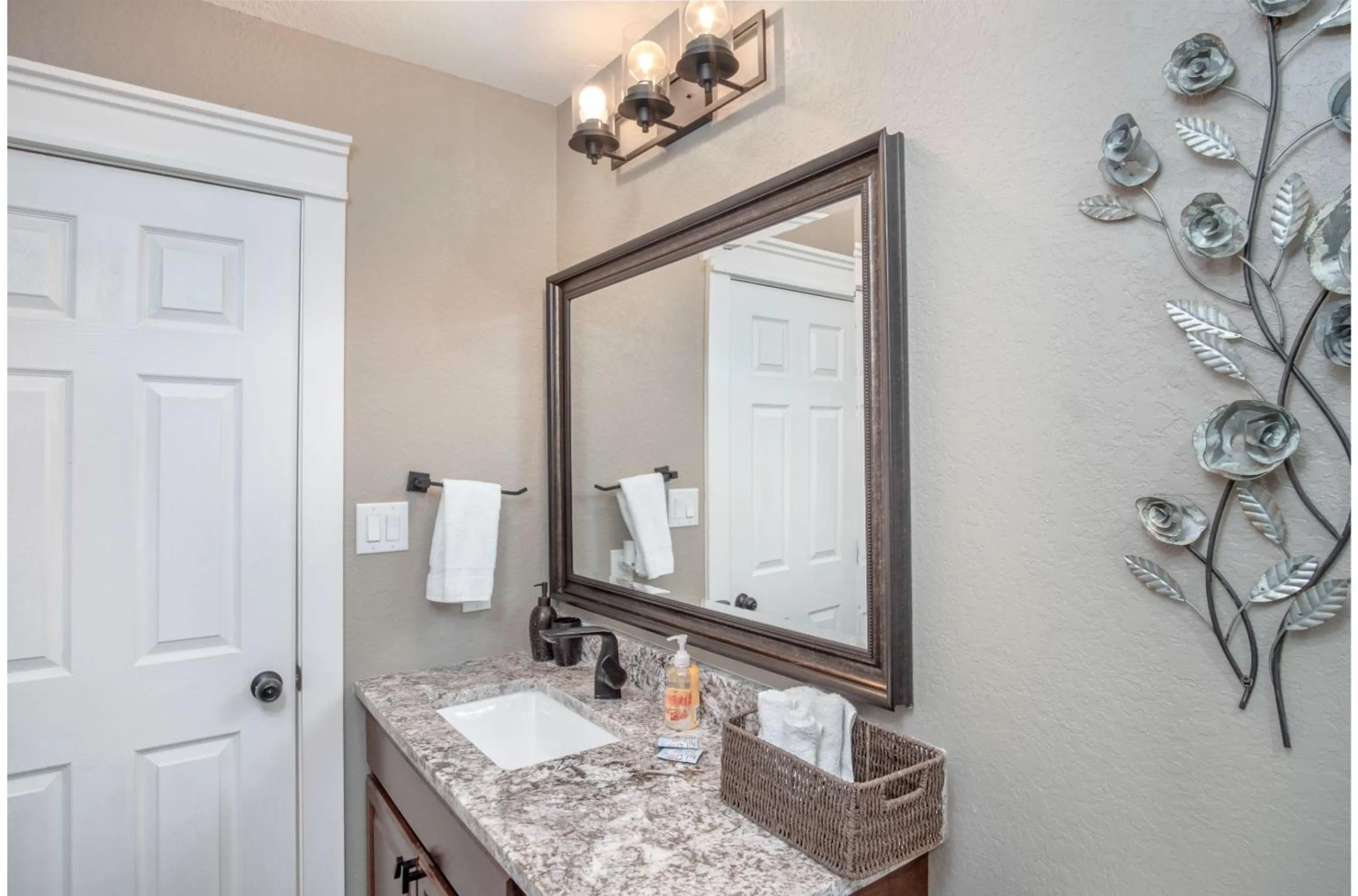 Bathroom in Lovely 3 BR Home Only 9 Minutes from Downtown
