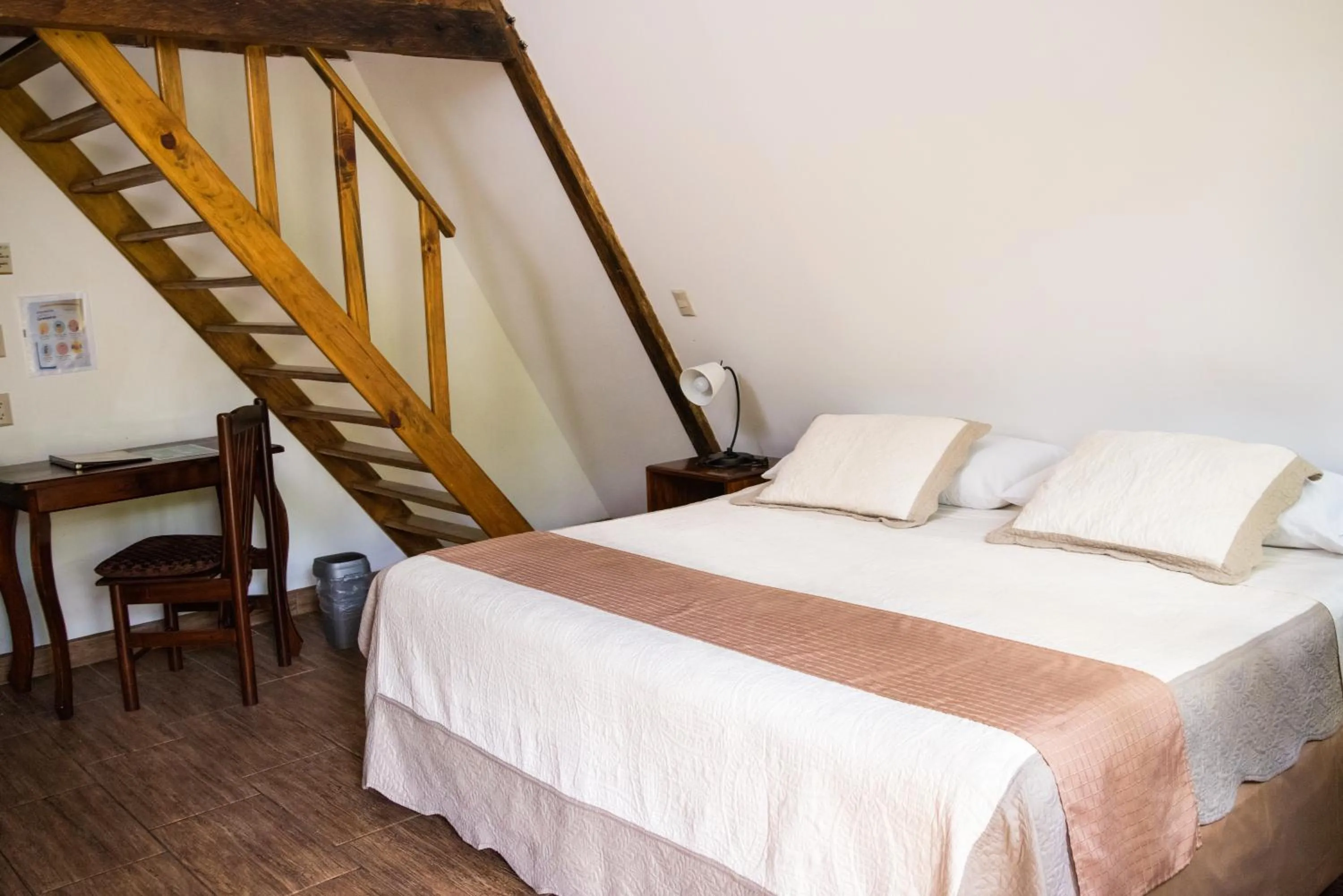 Bed in Hotel y Bungalows El Jardín