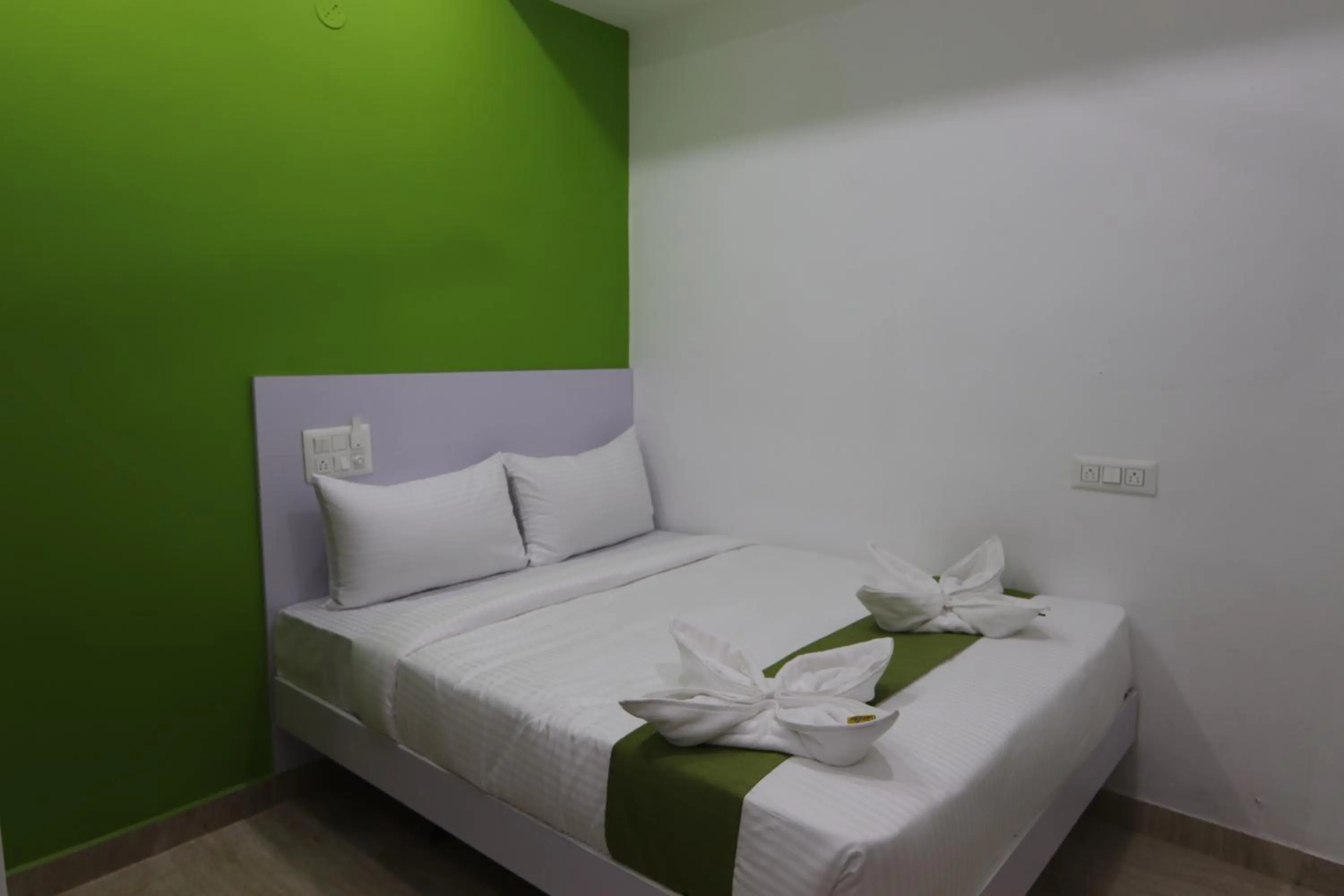 Bed in Athulya Stays