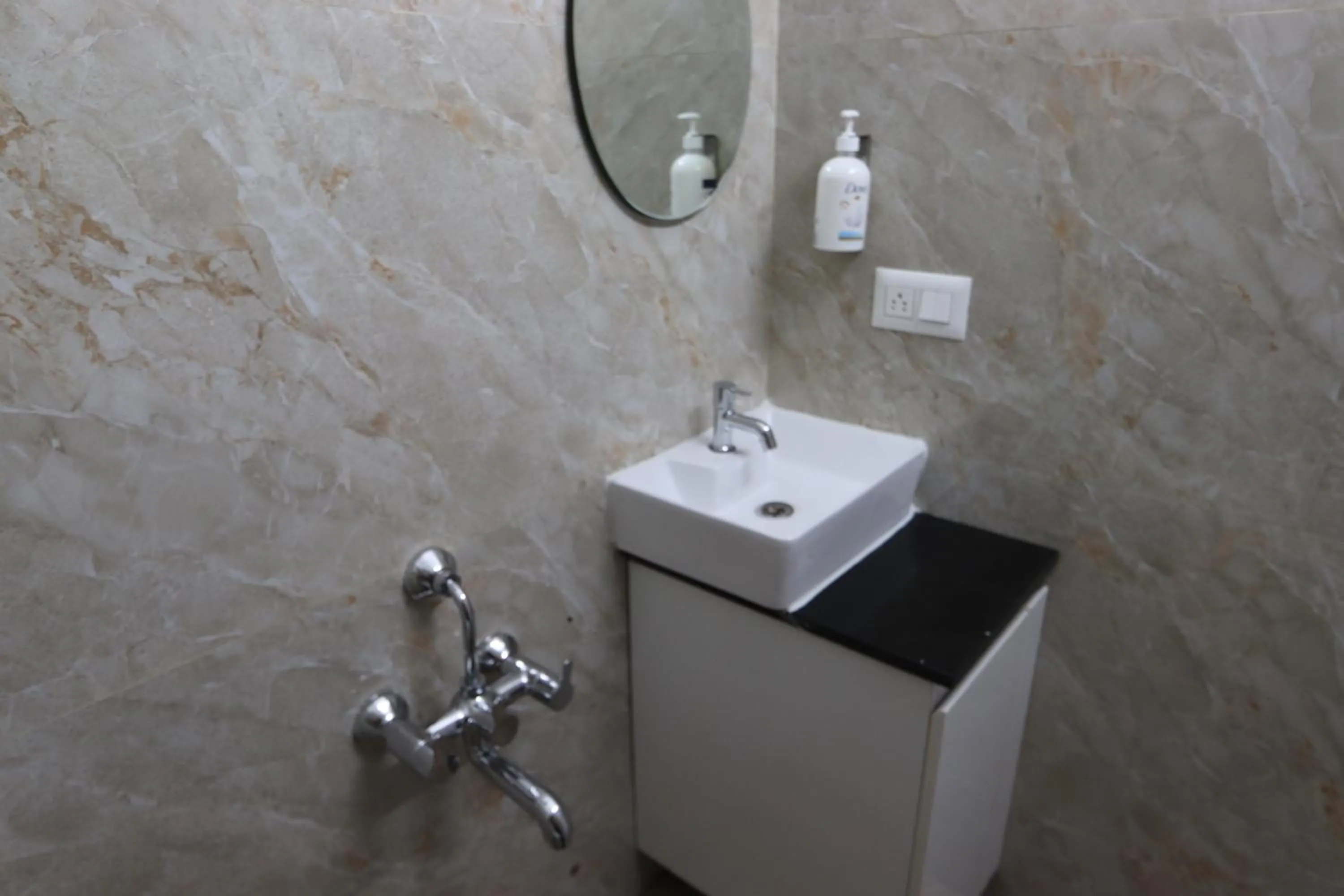 Bathroom in Athulya Stays