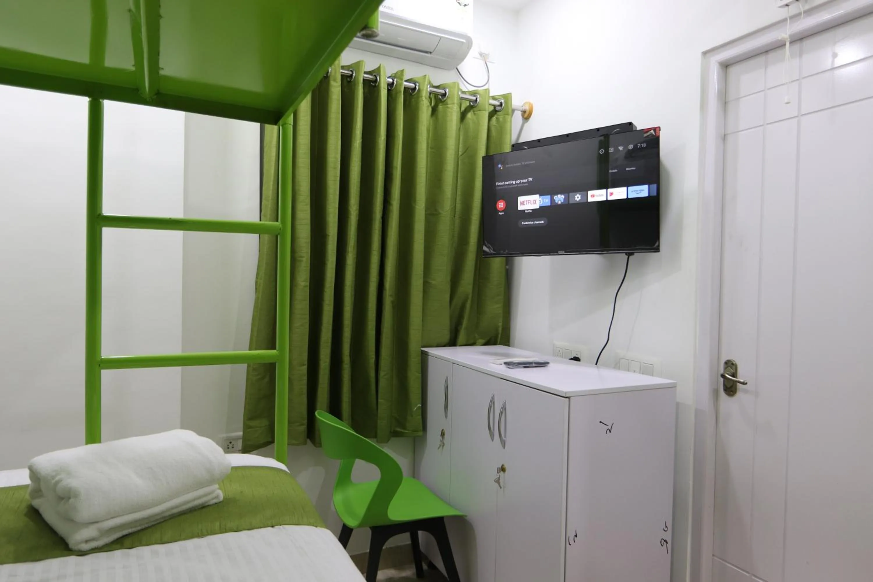 Bed in Athulya Stays