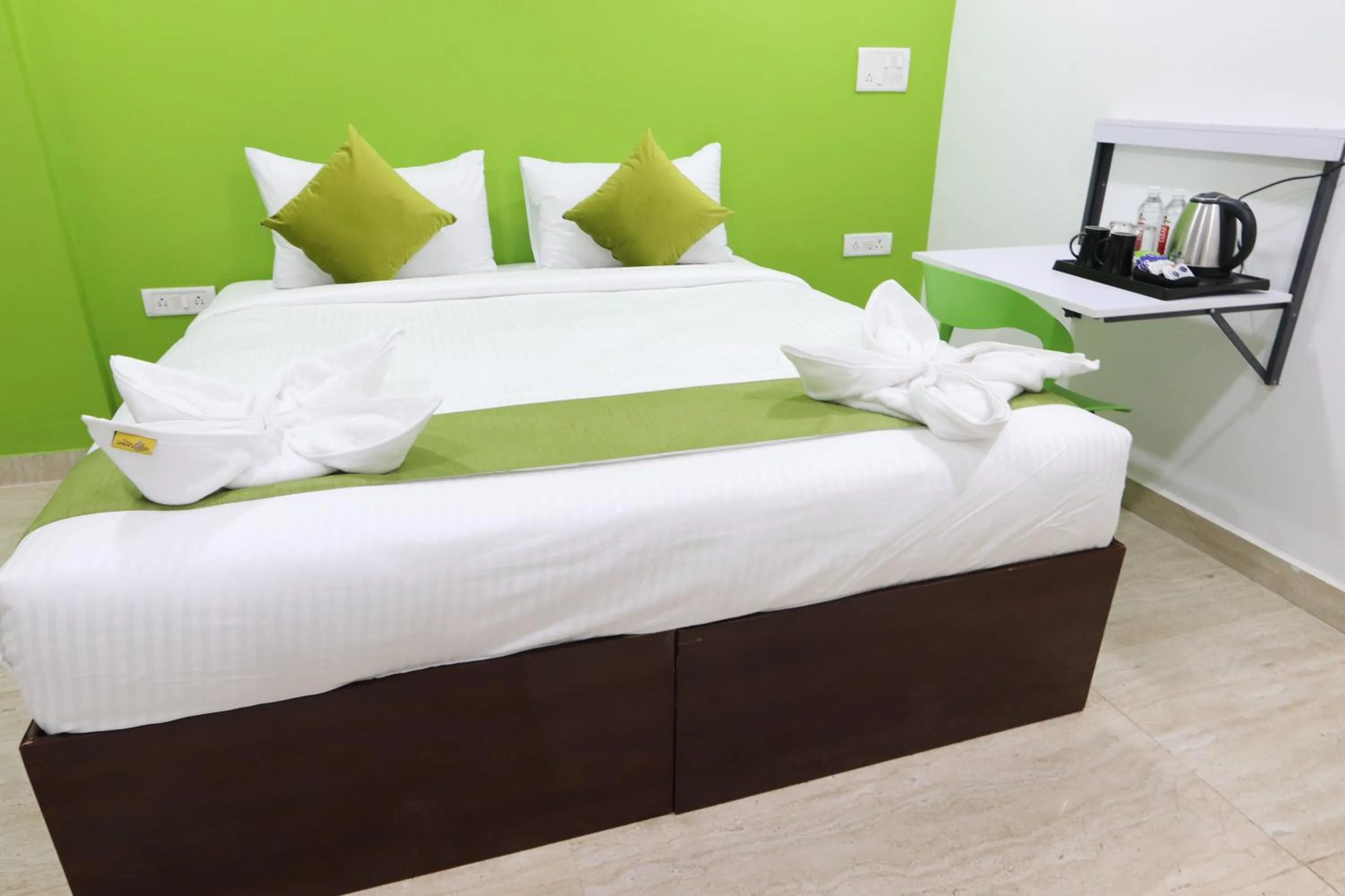 Bed in Athulya Stays