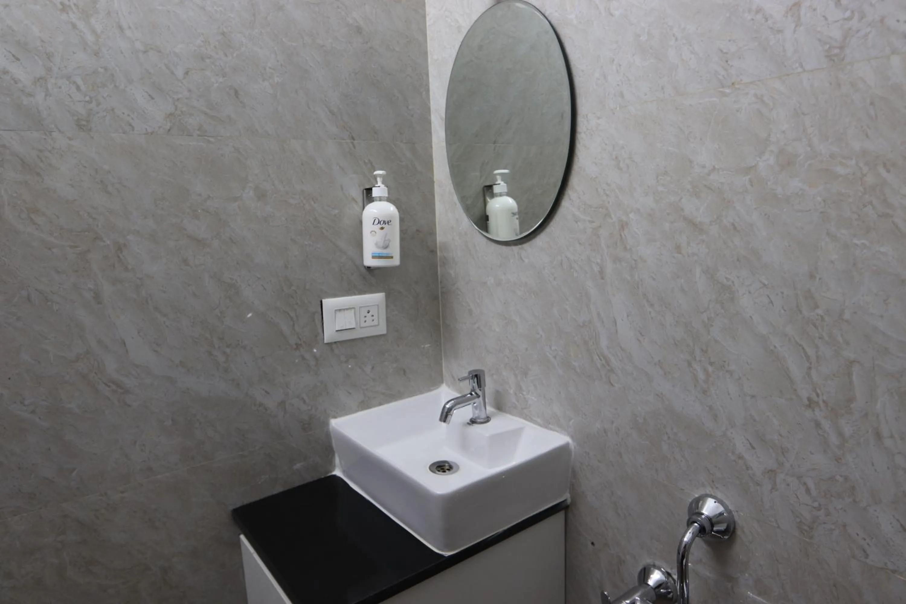 Bathroom in Athulya Stays