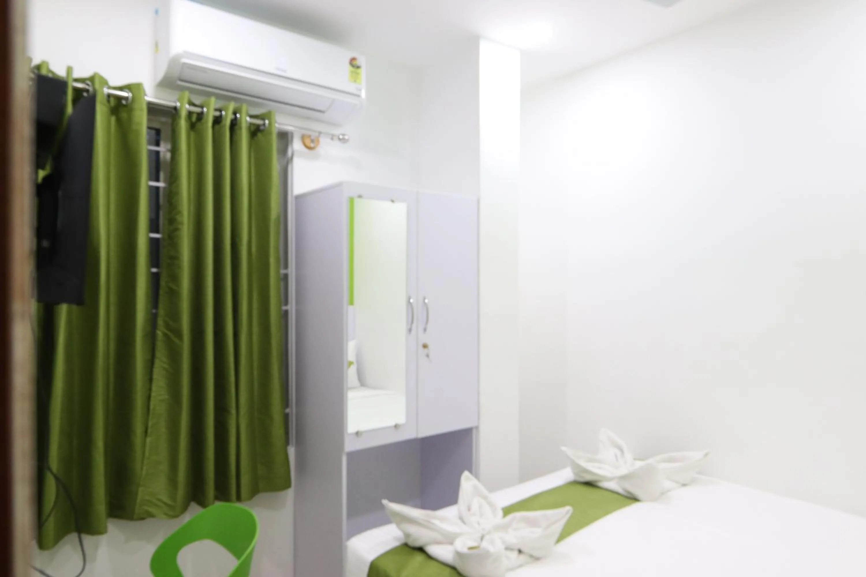 Bed in Athulya Stays