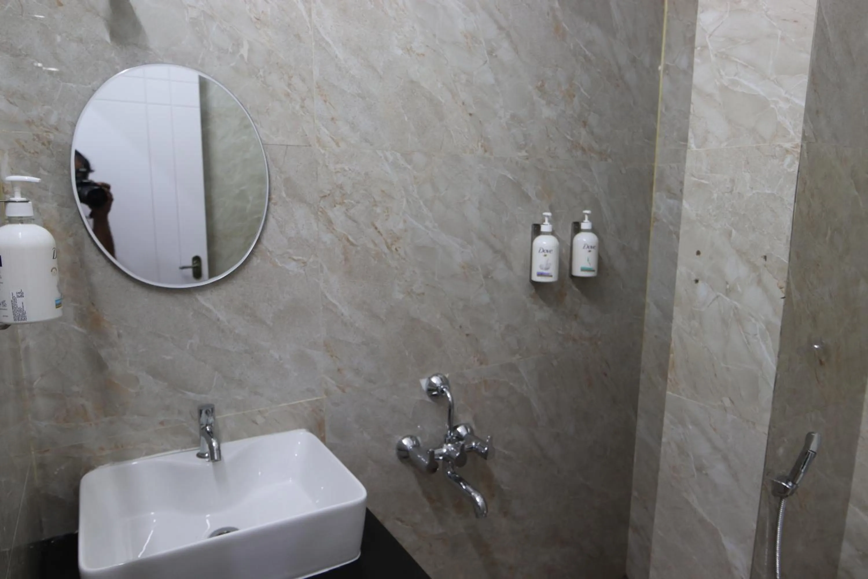 Shower in Athulya Stays