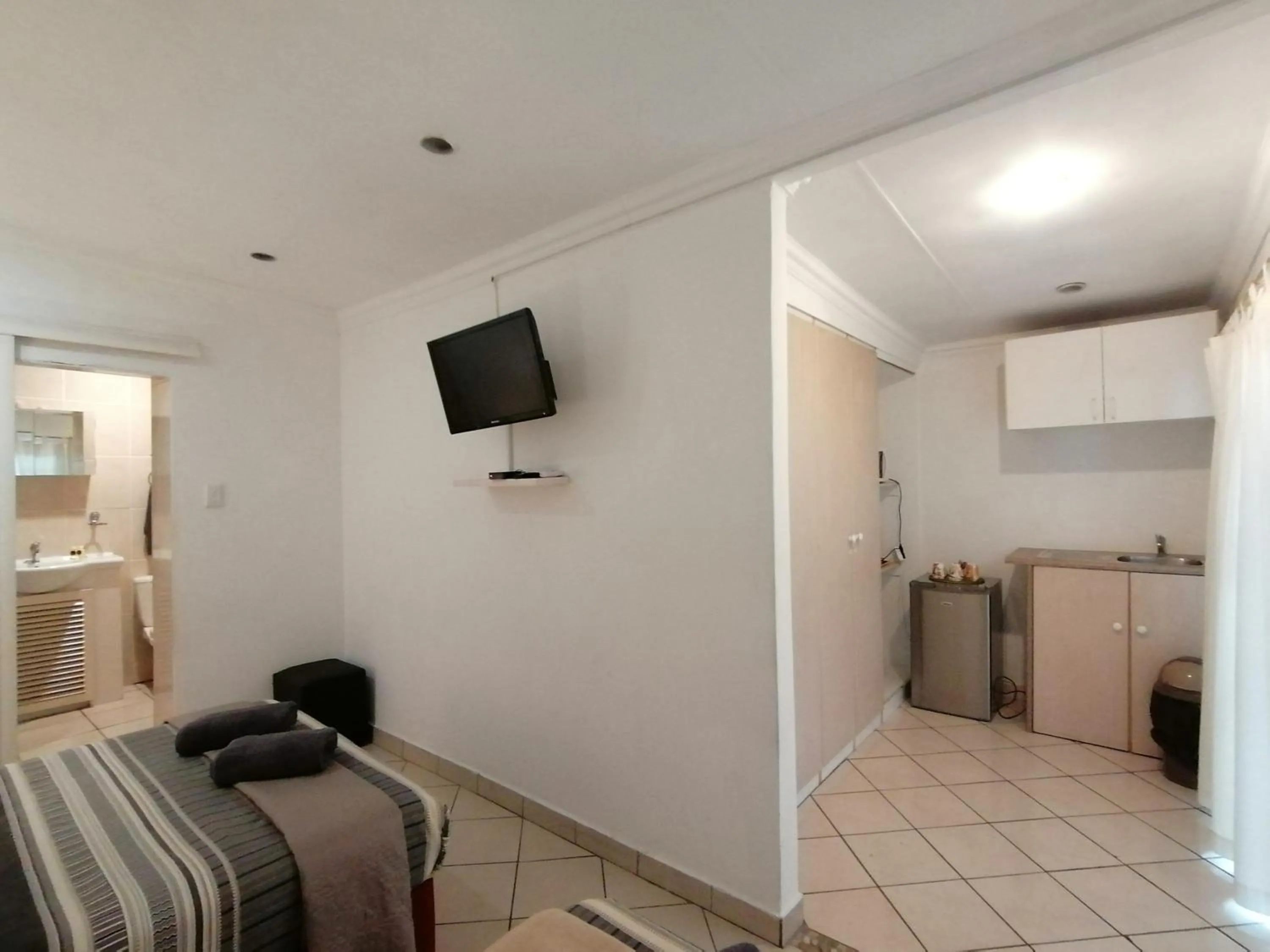 Bedroom in Palm View Guest House