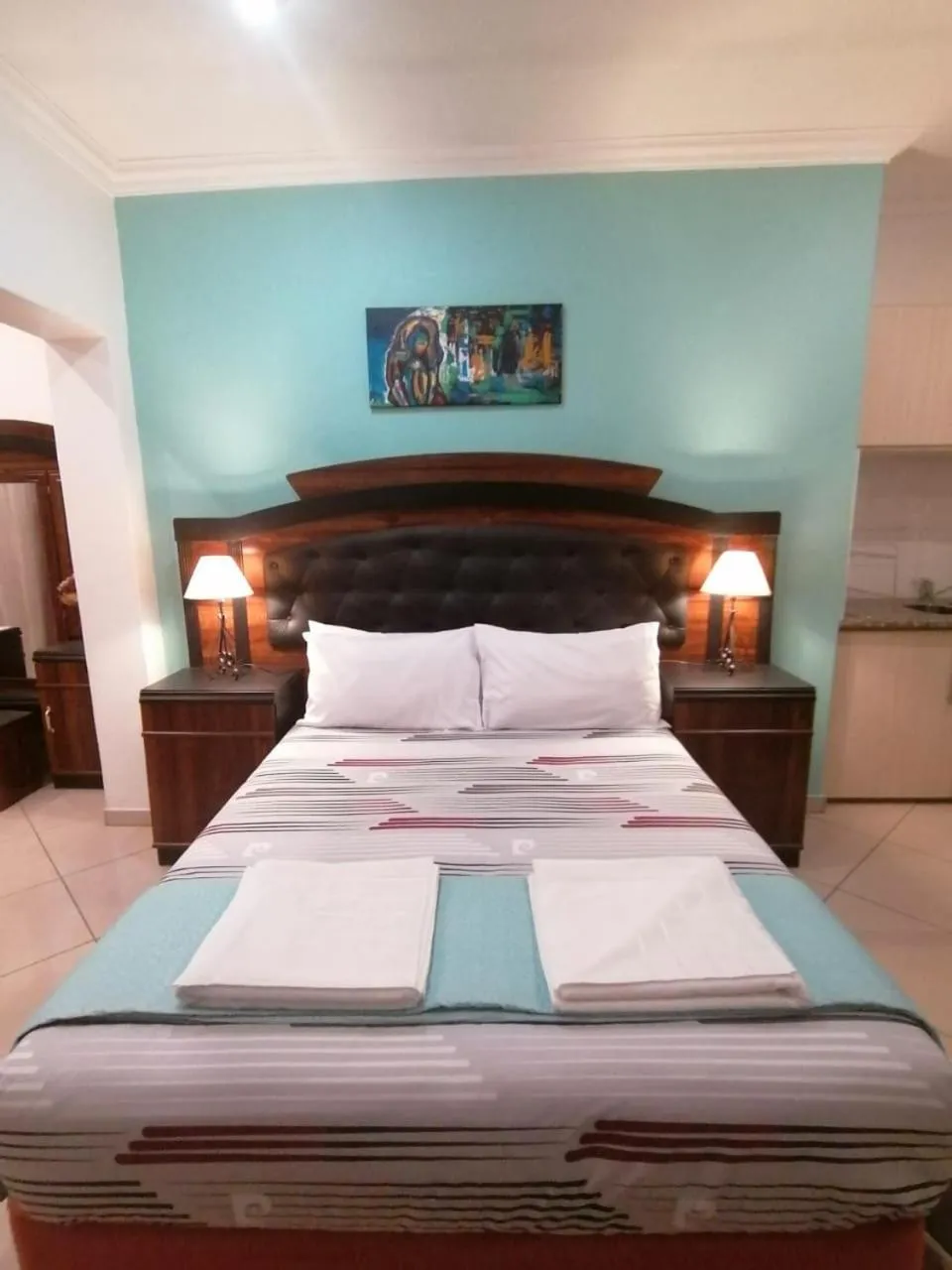 Bed in Palm View Guest House