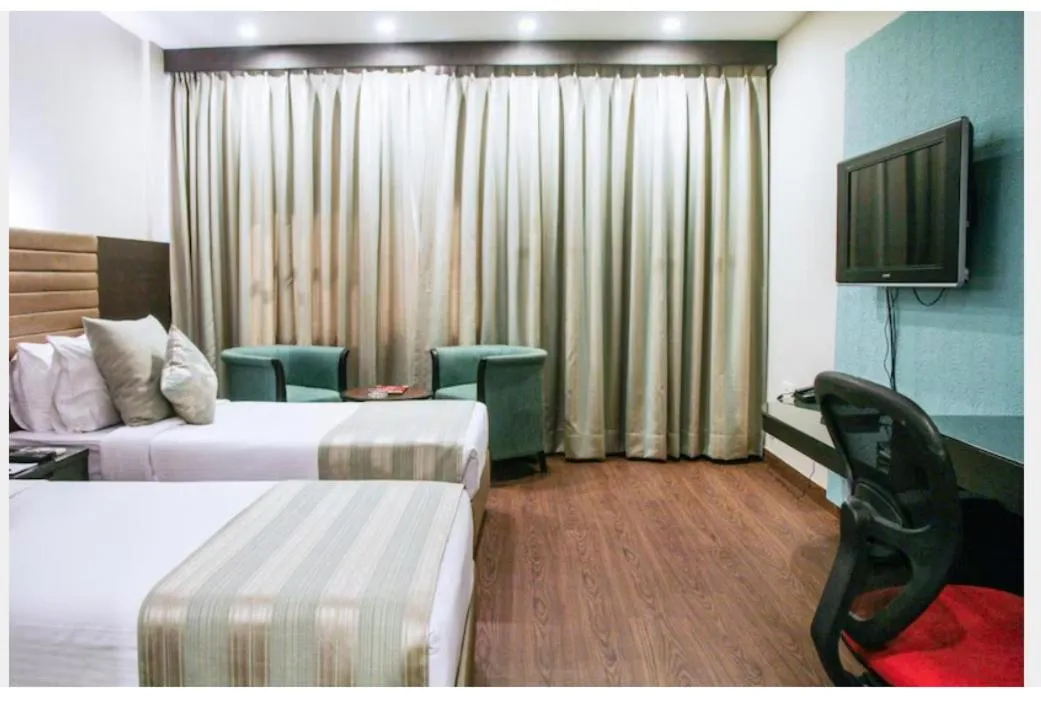 Bed in Indismart Hotel