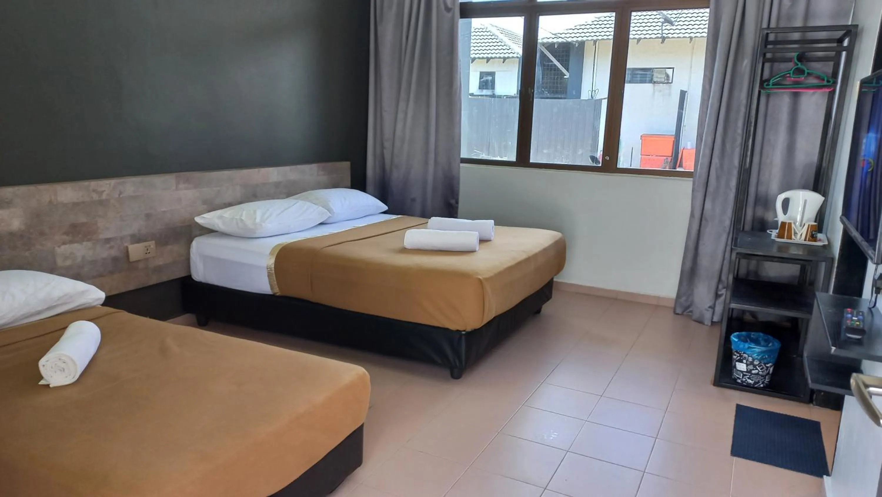 Photo of the whole room, Bed in DLAYARAN HOTEL & CAFE