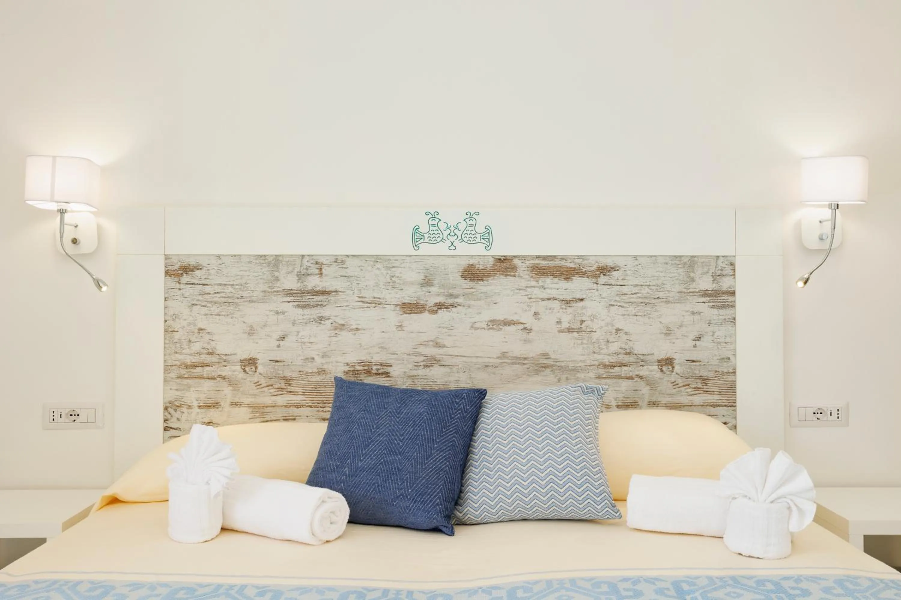 Bed in Mercury Beach Hotel