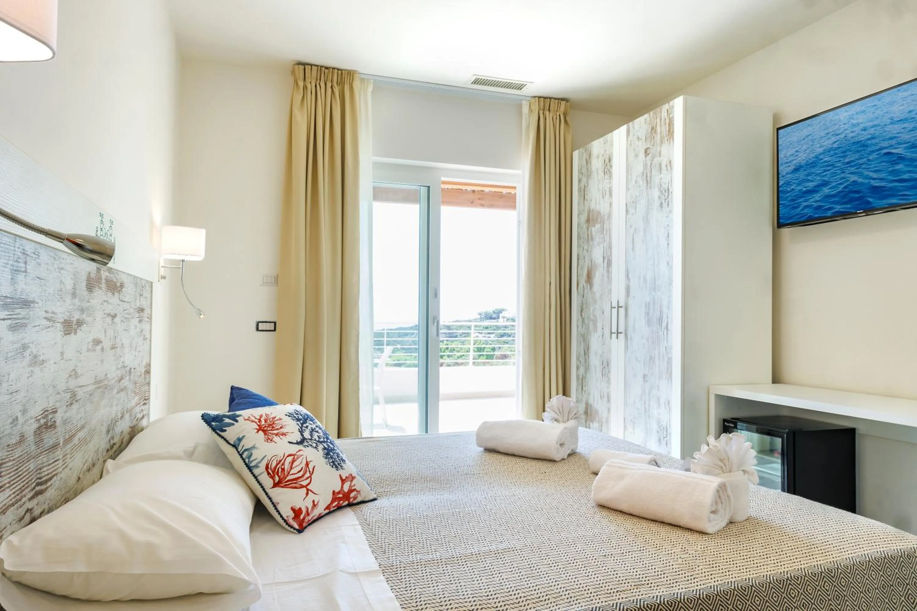 Bed in Mercury Beach Hotel