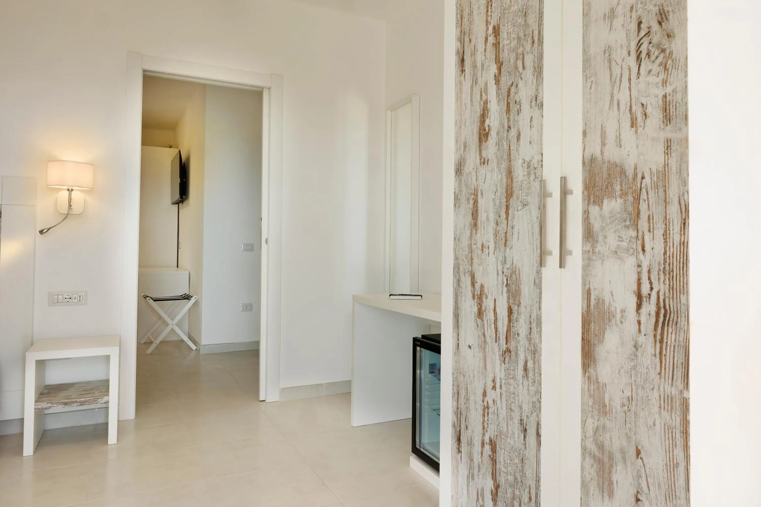 Bed in Mercury Beach Hotel