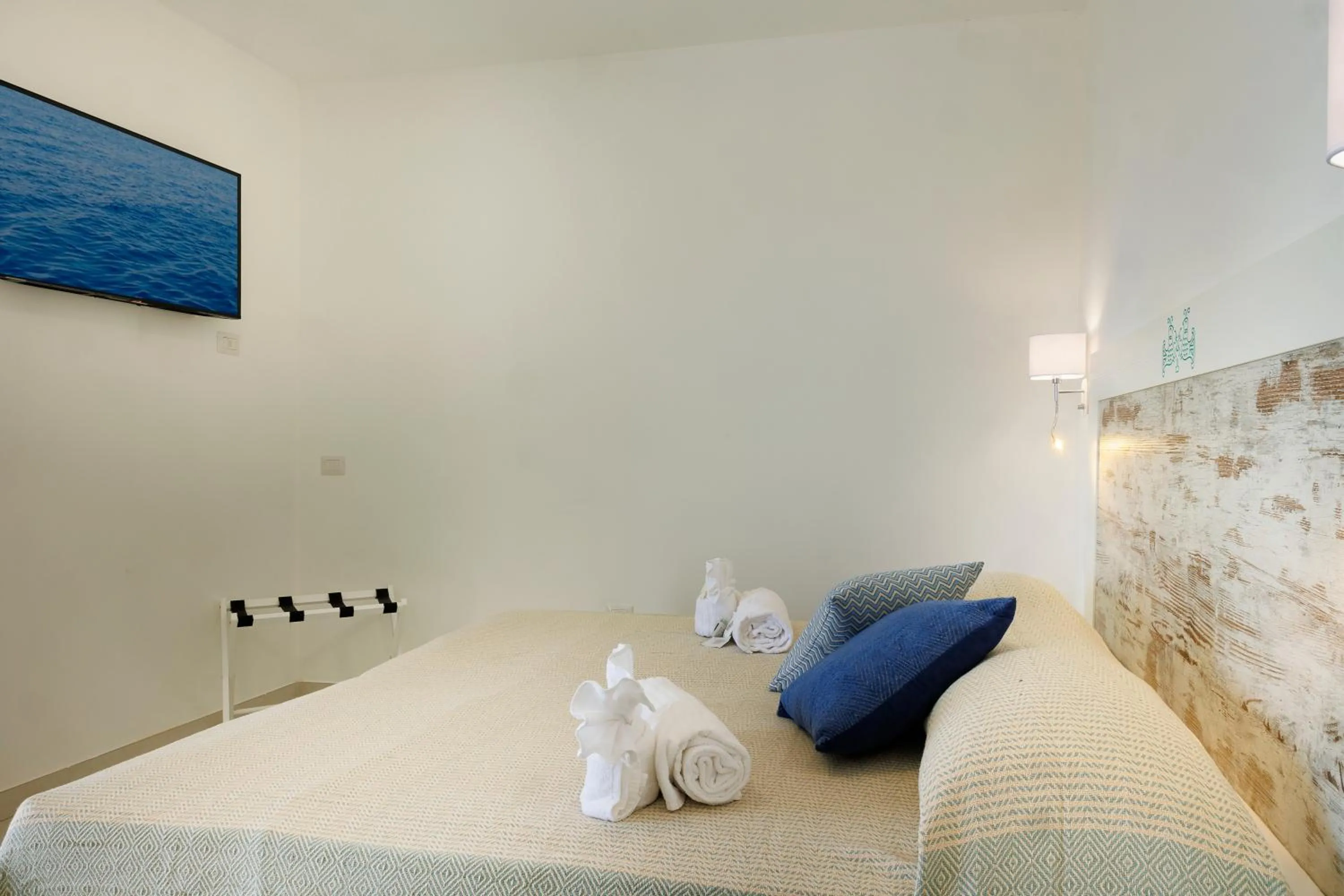 Bed in Mercury Beach Hotel