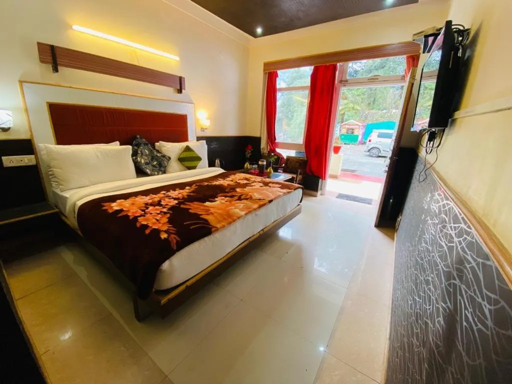 Bedroom, Bed in Hotel Aroma Nainital In house parking