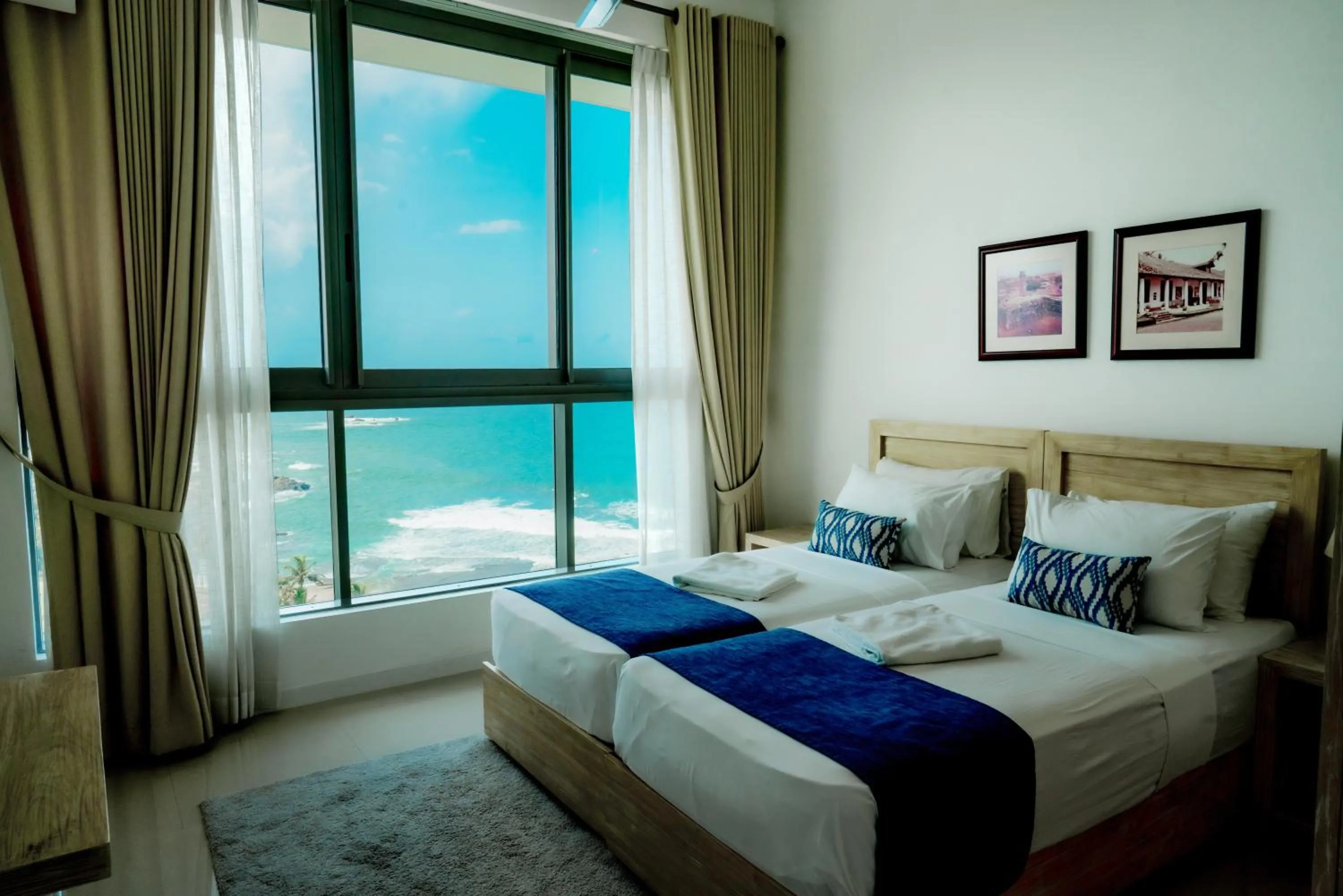 Photo of the whole room, Bed in Oceanfront Galle by ICC