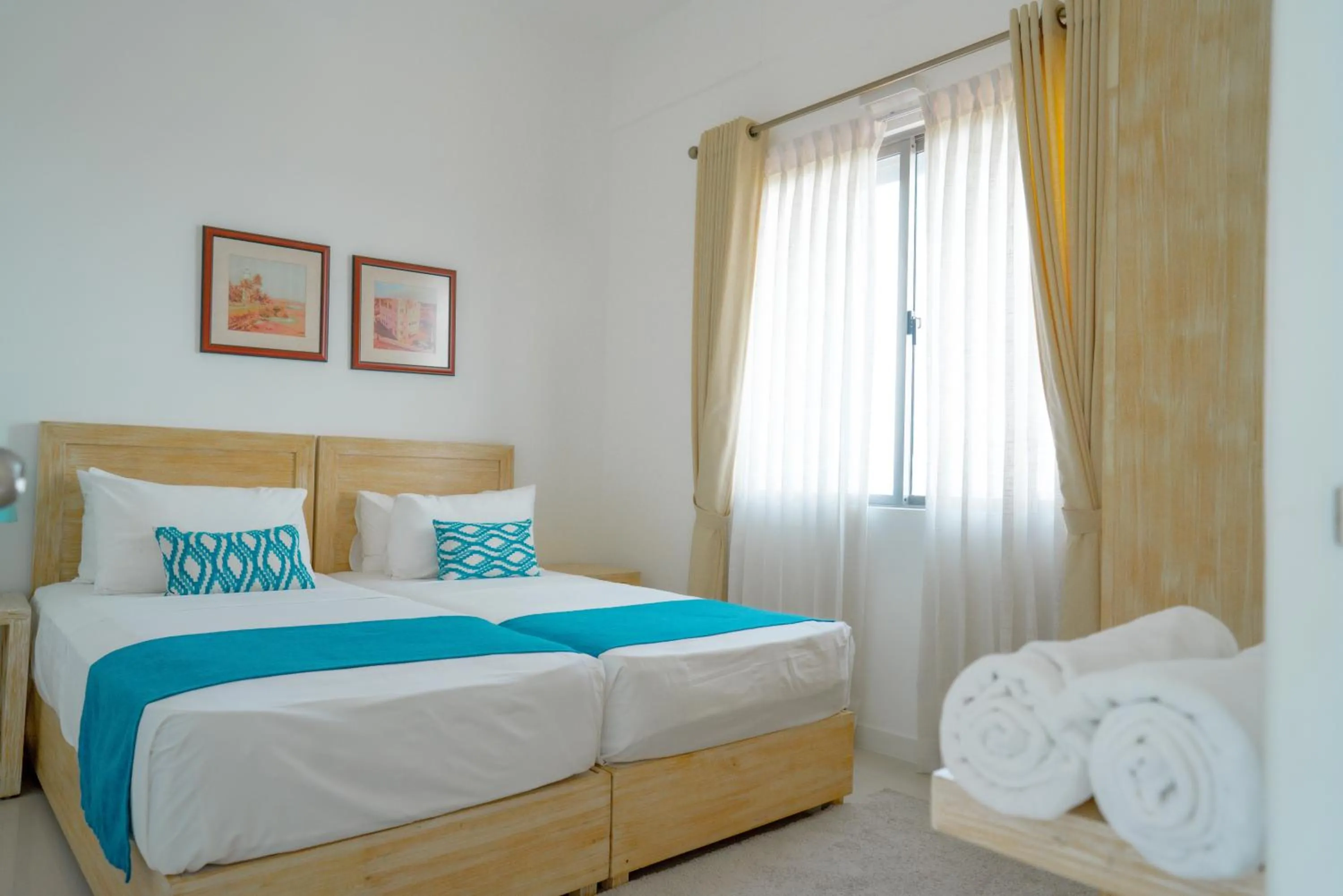 Bed in Oceanfront Galle by ICC