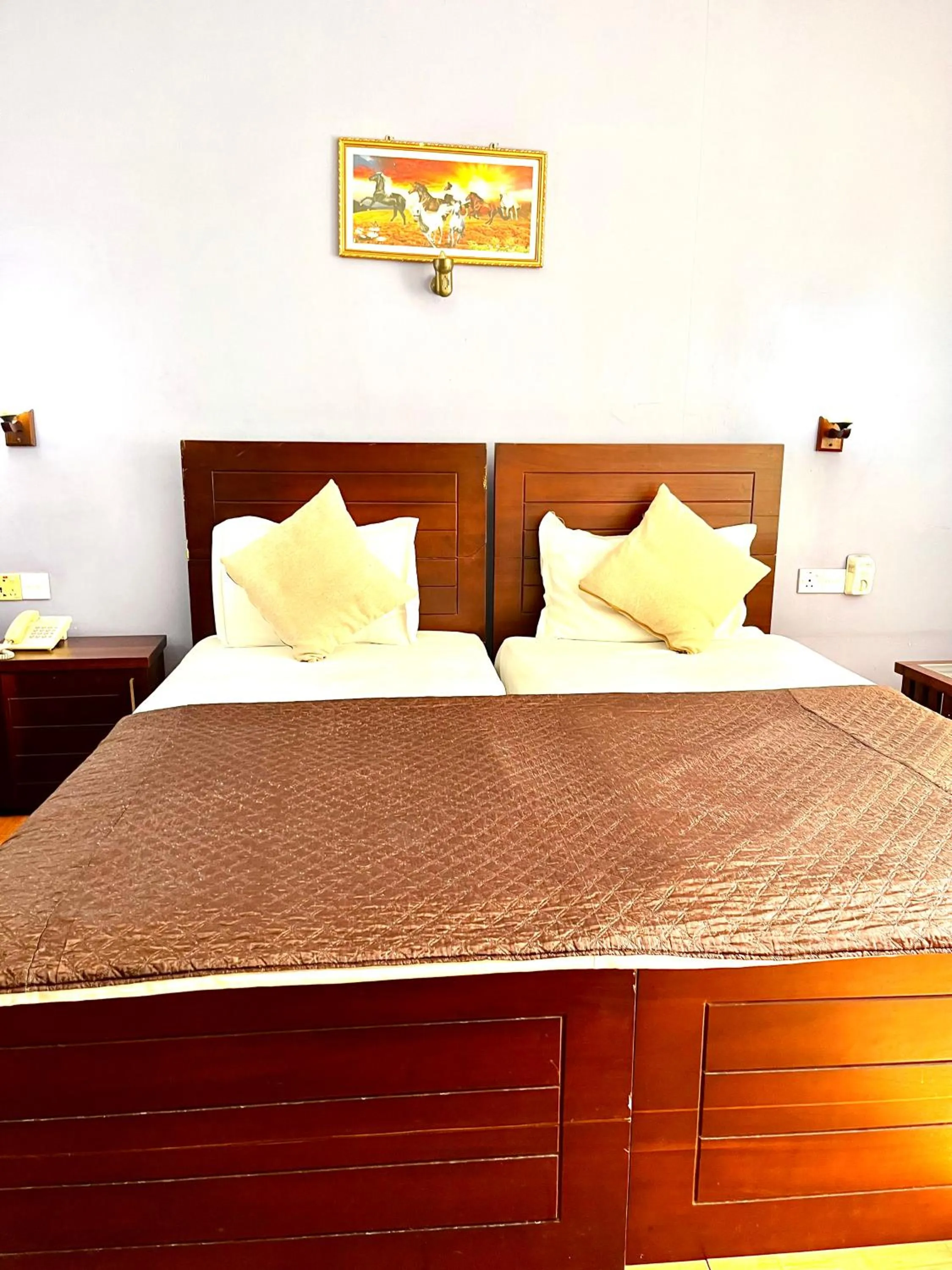Bed in Subhas Tourist Hotel