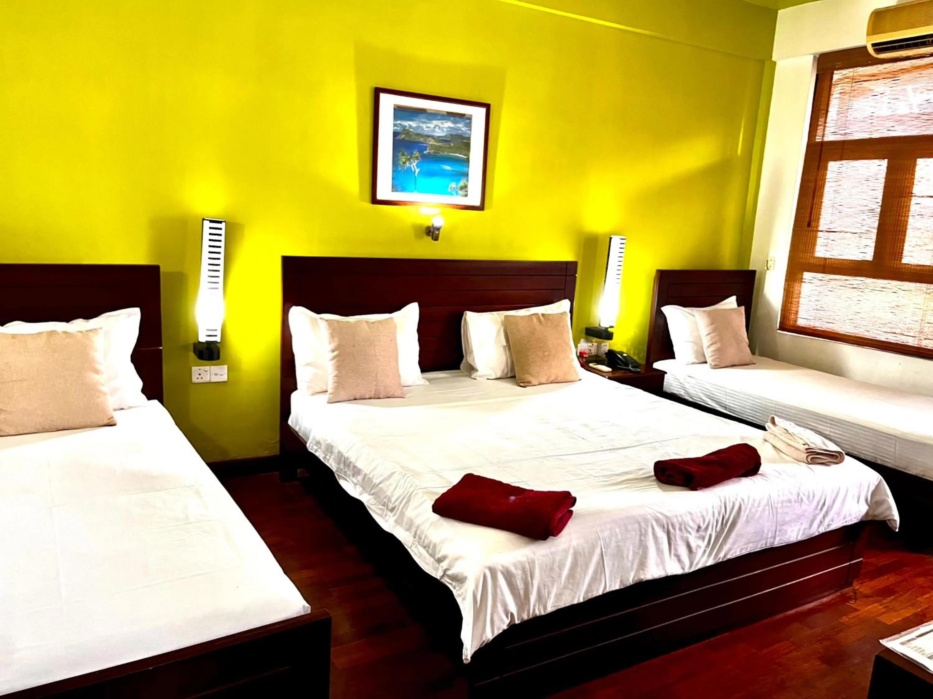 Photo of the whole room, Bed in Subhas Tourist Hotel