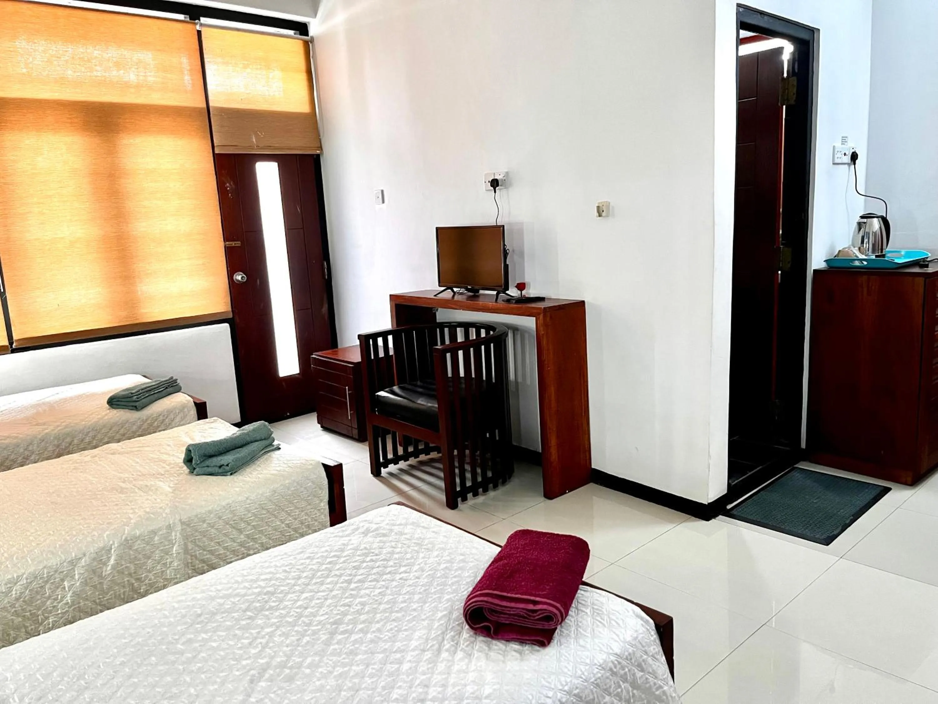 Bed in Subhas Tourist Hotel